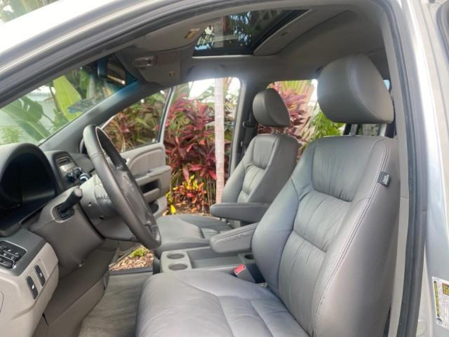 2010 Slate Green Metallic /Gray Honda Odyssey EX-L LOW MILES 52,543 1 OWNER FL (5FNRL3H62AB) with an 3.5L SOHC MPFI 24-Valve i-VTEC V6 Engine engine, Automatic transmission, located at 4701 North Dixie Hwy, Pompano Beach, FL, 33064, (954) 422-2889, 26.240938, -80.123474 - OUR WEBPAGE FLORIDACARS1.COM HAS OVER 100 PHOTOS AND FREE CARFAX LINK 2010 HONDA ODYSSEY EX-L VIN: 5FNRL3H62AB112651 5 F N R L 3 H 6 2 A B 1 1 2 6 5 1 VAN 3.5L V6 F SOHC 24V GASOLINE FRONT WHEEL DRIVE Features ABS Brakes Air Conditioning Alloy Wheels AM/FM Stereo Automatic Transmission Auxiliary Aud - Photo#10