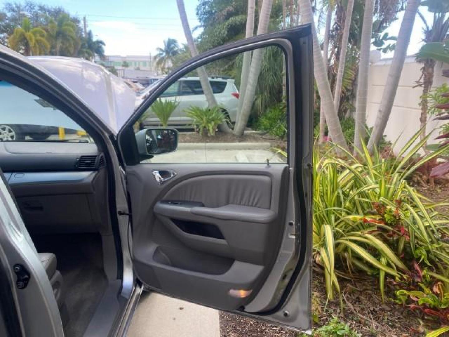 2010 Slate Green Metallic /Gray Honda Odyssey EX-L LOW MILES 52,543 1 OWNER FL (5FNRL3H62AB) with an 3.5L SOHC MPFI 24-Valve i-VTEC V6 Engine engine, Automatic transmission, located at 4701 North Dixie Hwy, Pompano Beach, FL, 33064, (954) 422-2889, 26.240938, -80.123474 - OUR WEBPAGE FLORIDACARS1.COM HAS OVER 100 PHOTOS AND FREE CARFAX LINK 2010 HONDA ODYSSEY EX-L VIN: 5FNRL3H62AB112651 5 F N R L 3 H 6 2 A B 1 1 2 6 5 1 VAN 3.5L V6 F SOHC 24V GASOLINE FRONT WHEEL DRIVE Features ABS Brakes Air Conditioning Alloy Wheels AM/FM Stereo Automatic Transmission Auxiliary Aud - Photo#11