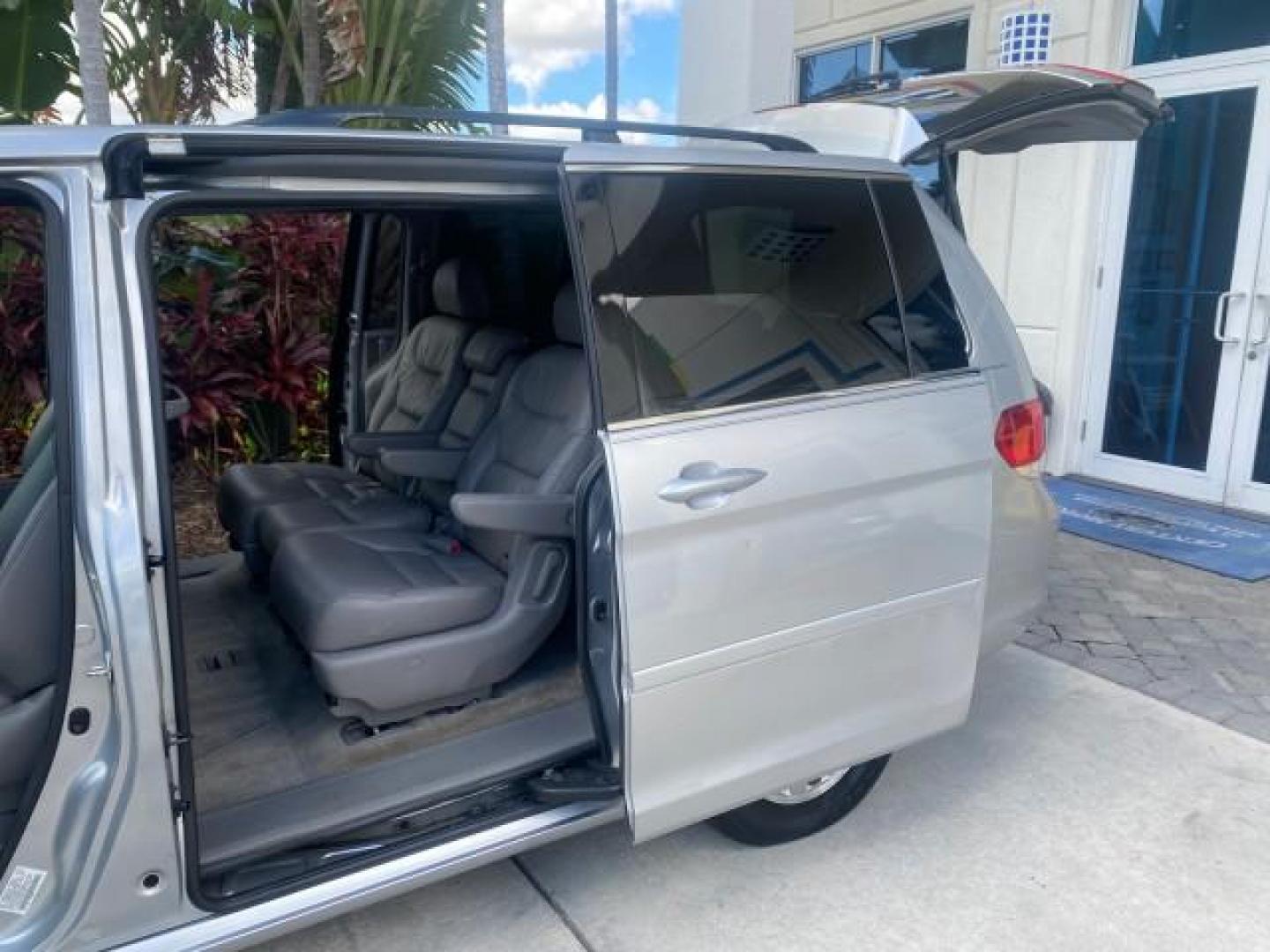 2010 Slate Green Metallic /Gray Honda Odyssey EX-L LOW MILES 52,543 1 OWNER FL (5FNRL3H62AB) with an 3.5L SOHC MPFI 24-Valve i-VTEC V6 Engine engine, Automatic transmission, located at 4701 North Dixie Hwy, Pompano Beach, FL, 33064, (954) 422-2889, 26.240938, -80.123474 - OUR WEBPAGE FLORIDACARS1.COM HAS OVER 100 PHOTOS AND FREE CARFAX LINK 2010 HONDA ODYSSEY EX-L VIN: 5FNRL3H62AB112651 5 F N R L 3 H 6 2 A B 1 1 2 6 5 1 VAN 3.5L V6 F SOHC 24V GASOLINE FRONT WHEEL DRIVE Features ABS Brakes Air Conditioning Alloy Wheels AM/FM Stereo Automatic Transmission Auxiliary Aud - Photo#13