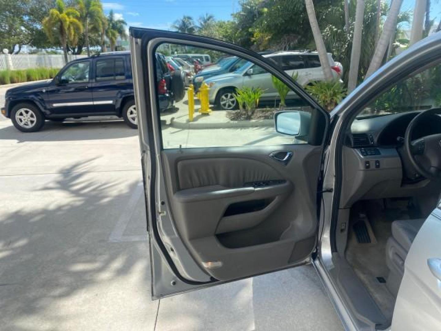 2010 Slate Green Metallic /Gray Honda Odyssey EX-L LOW MILES 52,543 1 OWNER FL (5FNRL3H62AB) with an 3.5L SOHC MPFI 24-Valve i-VTEC V6 Engine engine, Automatic transmission, located at 4701 North Dixie Hwy, Pompano Beach, FL, 33064, (954) 422-2889, 26.240938, -80.123474 - OUR WEBPAGE FLORIDACARS1.COM HAS OVER 100 PHOTOS AND FREE CARFAX LINK 2010 HONDA ODYSSEY EX-L VIN: 5FNRL3H62AB112651 5 F N R L 3 H 6 2 A B 1 1 2 6 5 1 VAN 3.5L V6 F SOHC 24V GASOLINE FRONT WHEEL DRIVE Features ABS Brakes Air Conditioning Alloy Wheels AM/FM Stereo Automatic Transmission Auxiliary Aud - Photo#31