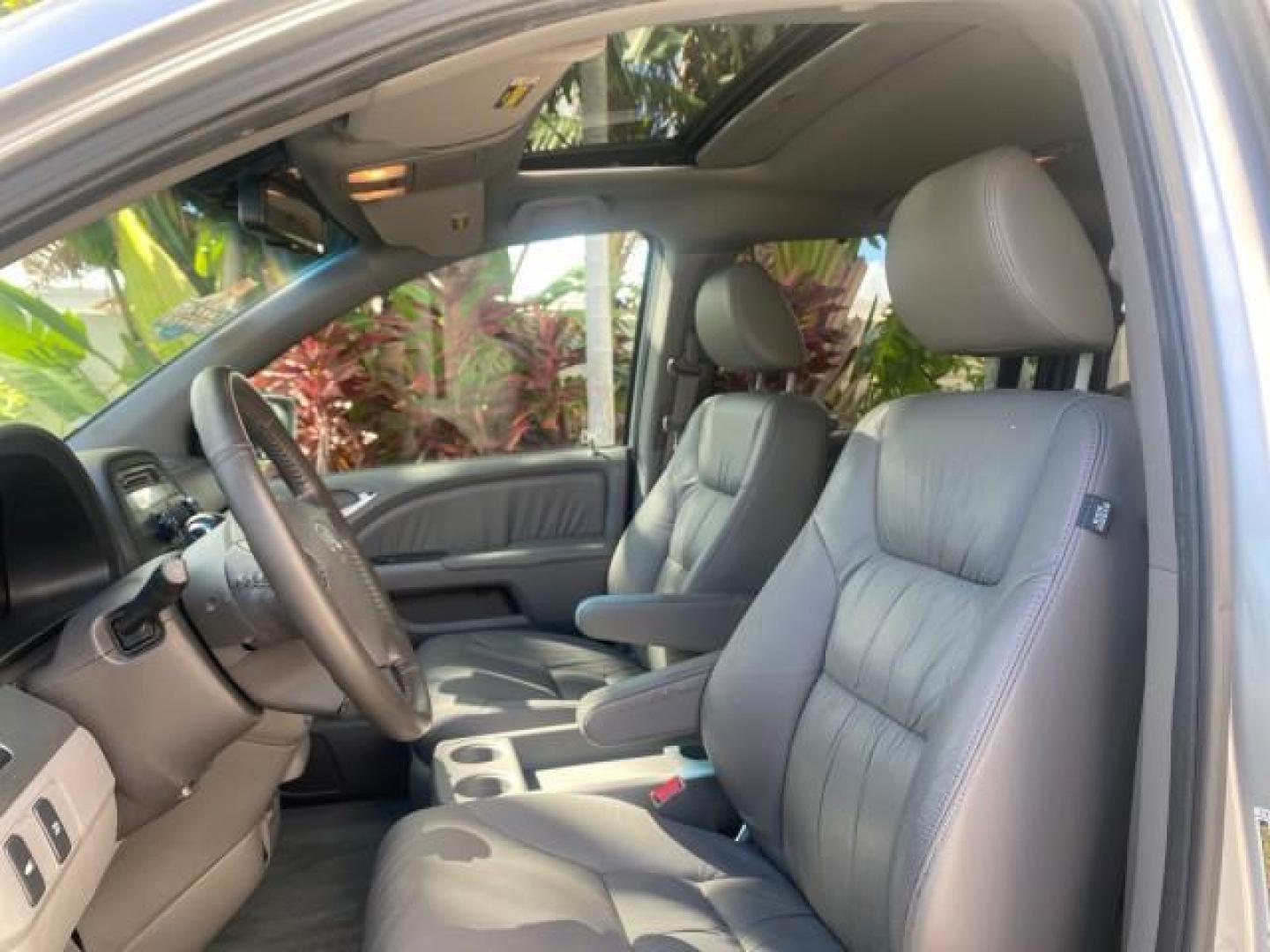 2010 Slate Green Metallic /Gray Honda Odyssey EX-L LOW MILES 52,543 1 OWNER FL (5FNRL3H62AB) with an 3.5L SOHC MPFI 24-Valve i-VTEC V6 Engine engine, Automatic transmission, located at 4701 North Dixie Hwy, Pompano Beach, FL, 33064, (954) 422-2889, 26.240938, -80.123474 - OUR WEBPAGE FLORIDACARS1.COM HAS OVER 100 PHOTOS AND FREE CARFAX LINK 2010 HONDA ODYSSEY EX-L VIN: 5FNRL3H62AB112651 5 F N R L 3 H 6 2 A B 1 1 2 6 5 1 VAN 3.5L V6 F SOHC 24V GASOLINE FRONT WHEEL DRIVE Features ABS Brakes Air Conditioning Alloy Wheels AM/FM Stereo Automatic Transmission Auxiliary Aud - Photo#34