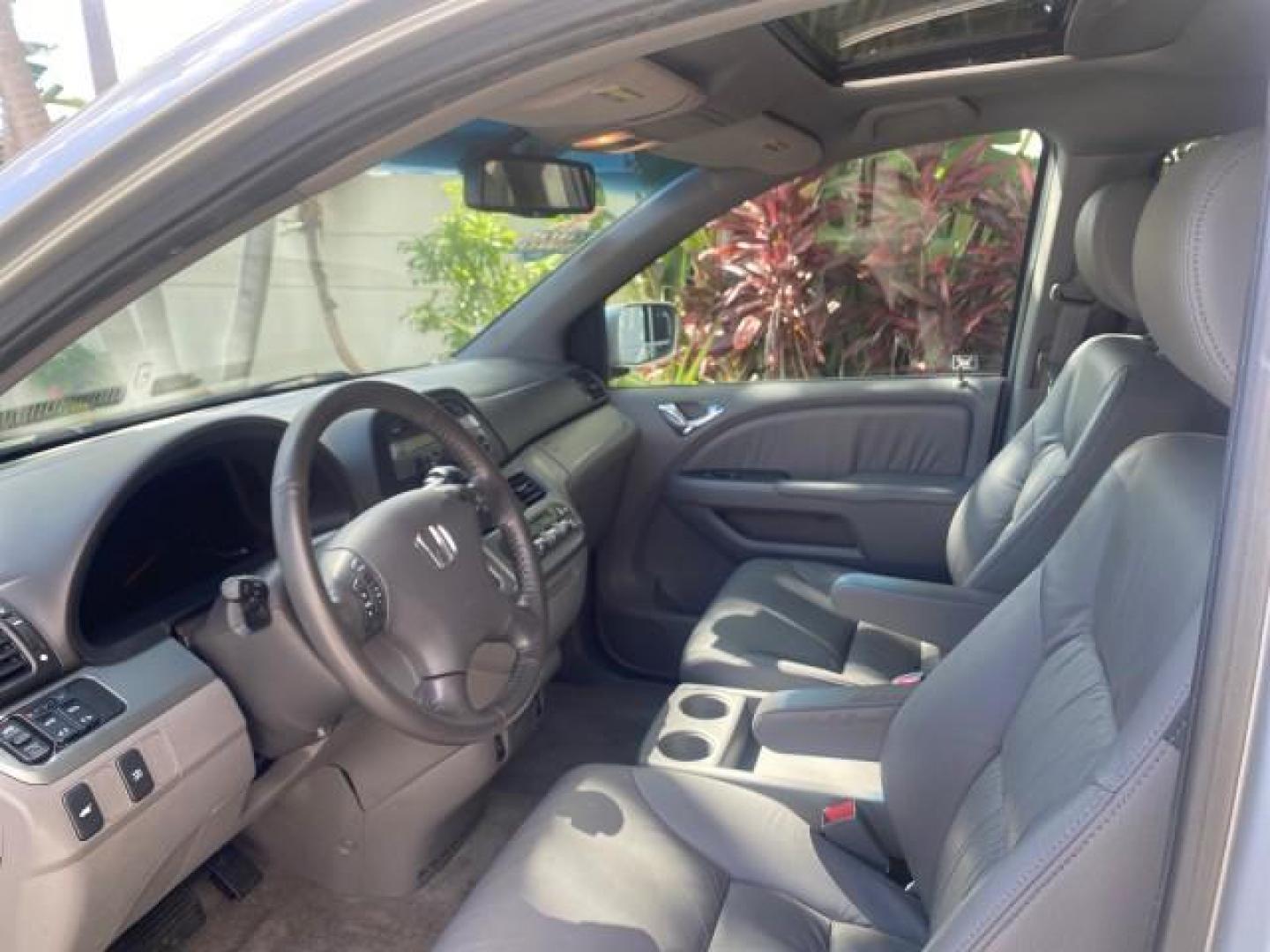 2010 Slate Green Metallic /Gray Honda Odyssey EX-L LOW MILES 52,543 1 OWNER FL (5FNRL3H62AB) with an 3.5L SOHC MPFI 24-Valve i-VTEC V6 Engine engine, Automatic transmission, located at 4701 North Dixie Hwy, Pompano Beach, FL, 33064, (954) 422-2889, 26.240938, -80.123474 - OUR WEBPAGE FLORIDACARS1.COM HAS OVER 100 PHOTOS AND FREE CARFAX LINK 2010 HONDA ODYSSEY EX-L VIN: 5FNRL3H62AB112651 5 F N R L 3 H 6 2 A B 1 1 2 6 5 1 VAN 3.5L V6 F SOHC 24V GASOLINE FRONT WHEEL DRIVE Features ABS Brakes Air Conditioning Alloy Wheels AM/FM Stereo Automatic Transmission Auxiliary Aud - Photo#37