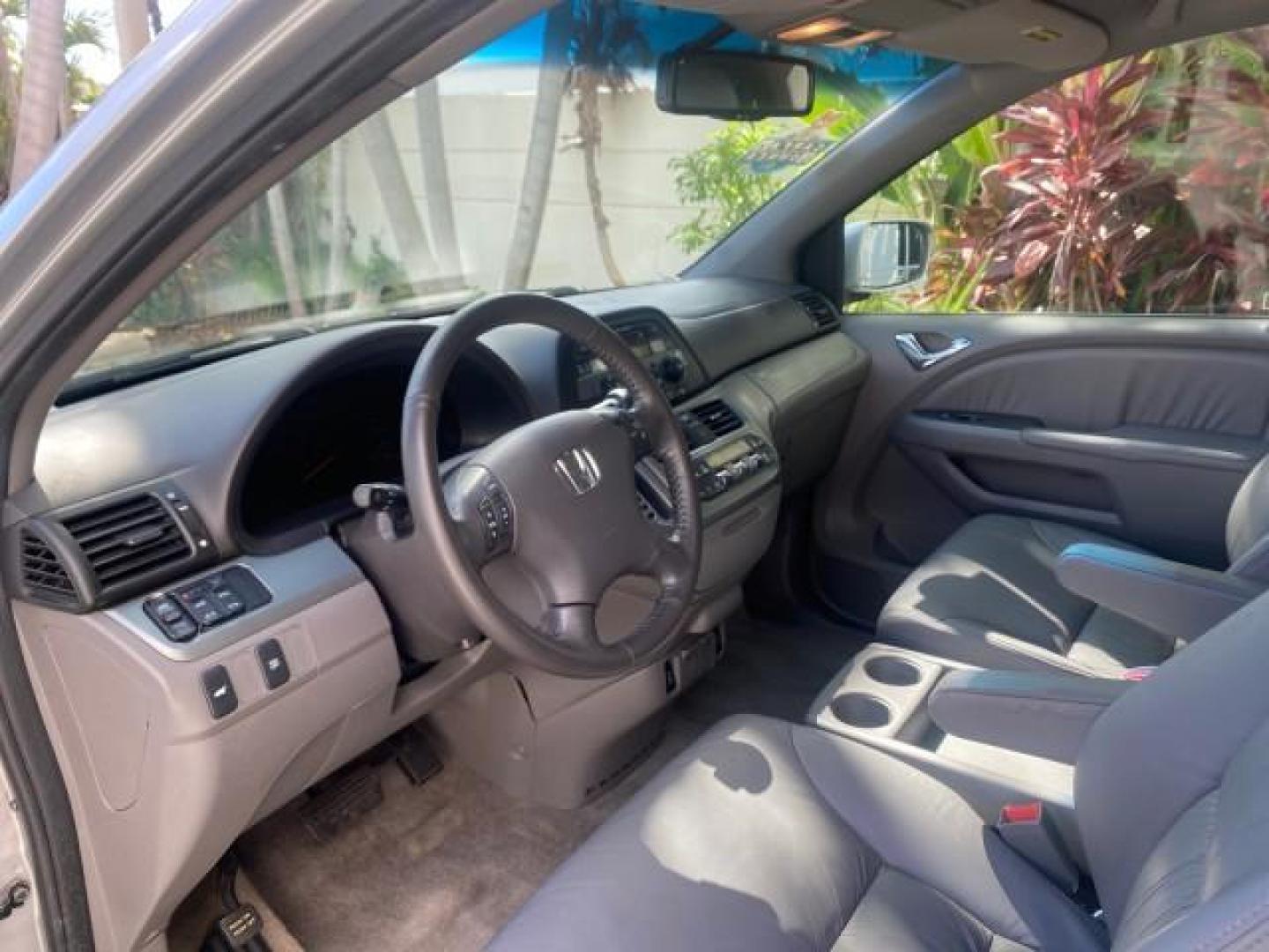 2010 Slate Green Metallic /Gray Honda Odyssey EX-L LOW MILES 52,543 1 OWNER FL (5FNRL3H62AB) with an 3.5L SOHC MPFI 24-Valve i-VTEC V6 Engine engine, Automatic transmission, located at 4701 North Dixie Hwy, Pompano Beach, FL, 33064, (954) 422-2889, 26.240938, -80.123474 - OUR WEBPAGE FLORIDACARS1.COM HAS OVER 100 PHOTOS AND FREE CARFAX LINK 2010 HONDA ODYSSEY EX-L VIN: 5FNRL3H62AB112651 5 F N R L 3 H 6 2 A B 1 1 2 6 5 1 VAN 3.5L V6 F SOHC 24V GASOLINE FRONT WHEEL DRIVE Features ABS Brakes Air Conditioning Alloy Wheels AM/FM Stereo Automatic Transmission Auxiliary Aud - Photo#38