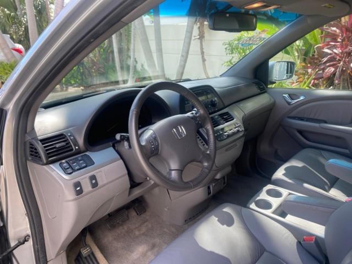 2010 Slate Green Metallic /Gray Honda Odyssey EX-L LOW MILES 52,543 1 OWNER FL (5FNRL3H62AB) with an 3.5L SOHC MPFI 24-Valve i-VTEC V6 Engine engine, Automatic transmission, located at 4701 North Dixie Hwy, Pompano Beach, FL, 33064, (954) 422-2889, 26.240938, -80.123474 - OUR WEBPAGE FLORIDACARS1.COM HAS OVER 100 PHOTOS AND FREE CARFAX LINK 2010 HONDA ODYSSEY EX-L VIN: 5FNRL3H62AB112651 5 F N R L 3 H 6 2 A B 1 1 2 6 5 1 VAN 3.5L V6 F SOHC 24V GASOLINE FRONT WHEEL DRIVE Features ABS Brakes Air Conditioning Alloy Wheels AM/FM Stereo Automatic Transmission Auxiliary Aud - Photo#39