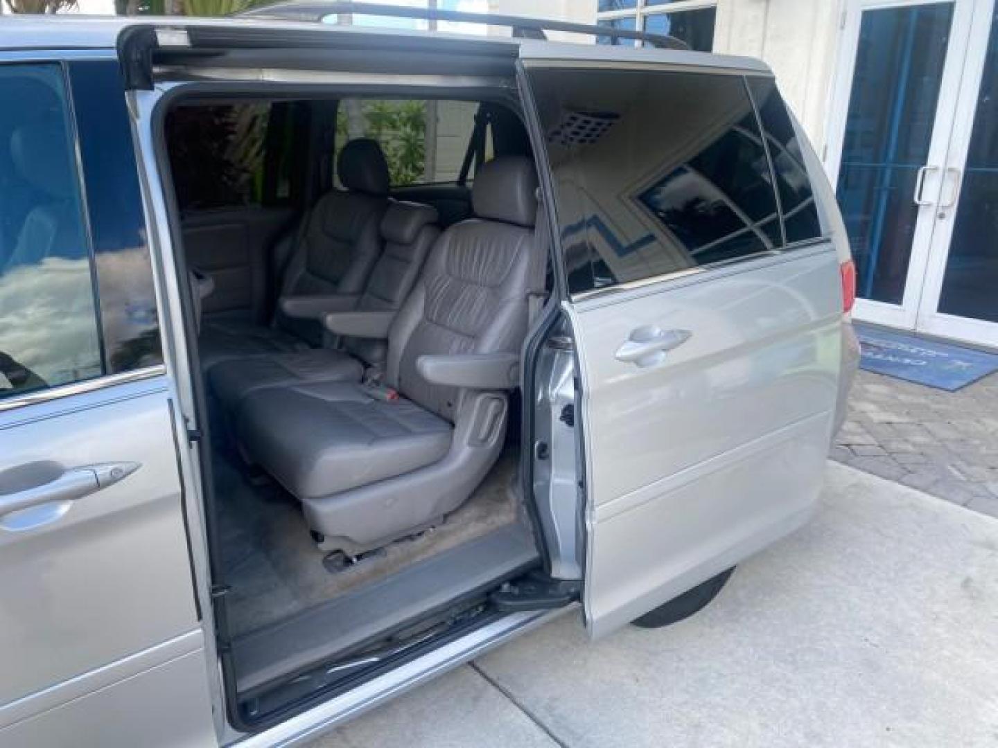 2010 Slate Green Metallic /Gray Honda Odyssey EX-L LOW MILES 52,543 1 OWNER FL (5FNRL3H62AB) with an 3.5L SOHC MPFI 24-Valve i-VTEC V6 Engine engine, Automatic transmission, located at 4701 North Dixie Hwy, Pompano Beach, FL, 33064, (954) 422-2889, 26.240938, -80.123474 - OUR WEBPAGE FLORIDACARS1.COM HAS OVER 100 PHOTOS AND FREE CARFAX LINK 2010 HONDA ODYSSEY EX-L VIN: 5FNRL3H62AB112651 5 F N R L 3 H 6 2 A B 1 1 2 6 5 1 VAN 3.5L V6 F SOHC 24V GASOLINE FRONT WHEEL DRIVE Features ABS Brakes Air Conditioning Alloy Wheels AM/FM Stereo Automatic Transmission Auxiliary Aud - Photo#69