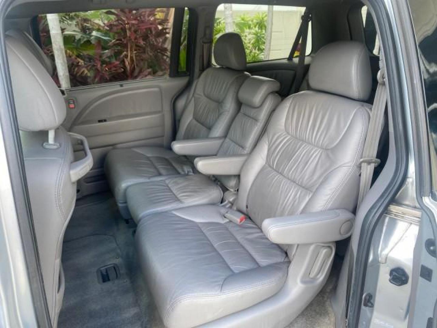 2010 Slate Green Metallic /Gray Honda Odyssey EX-L LOW MILES 52,543 1 OWNER FL (5FNRL3H62AB) with an 3.5L SOHC MPFI 24-Valve i-VTEC V6 Engine engine, Automatic transmission, located at 4701 North Dixie Hwy, Pompano Beach, FL, 33064, (954) 422-2889, 26.240938, -80.123474 - OUR WEBPAGE FLORIDACARS1.COM HAS OVER 100 PHOTOS AND FREE CARFAX LINK 2010 HONDA ODYSSEY EX-L VIN: 5FNRL3H62AB112651 5 F N R L 3 H 6 2 A B 1 1 2 6 5 1 VAN 3.5L V6 F SOHC 24V GASOLINE FRONT WHEEL DRIVE Features ABS Brakes Air Conditioning Alloy Wheels AM/FM Stereo Automatic Transmission Auxiliary Aud - Photo#70