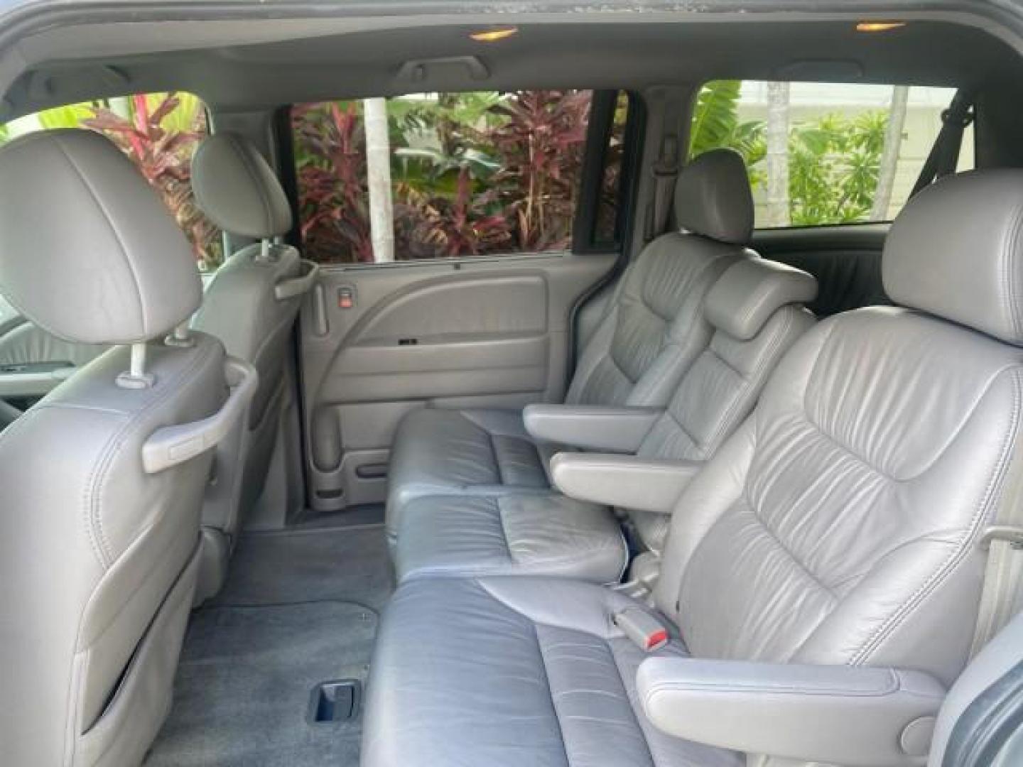 2010 Slate Green Metallic /Gray Honda Odyssey EX-L LOW MILES 52,543 1 OWNER FL (5FNRL3H62AB) with an 3.5L SOHC MPFI 24-Valve i-VTEC V6 Engine engine, Automatic transmission, located at 4701 North Dixie Hwy, Pompano Beach, FL, 33064, (954) 422-2889, 26.240938, -80.123474 - OUR WEBPAGE FLORIDACARS1.COM HAS OVER 100 PHOTOS AND FREE CARFAX LINK 2010 HONDA ODYSSEY EX-L VIN: 5FNRL3H62AB112651 5 F N R L 3 H 6 2 A B 1 1 2 6 5 1 VAN 3.5L V6 F SOHC 24V GASOLINE FRONT WHEEL DRIVE Features ABS Brakes Air Conditioning Alloy Wheels AM/FM Stereo Automatic Transmission Auxiliary Aud - Photo#71