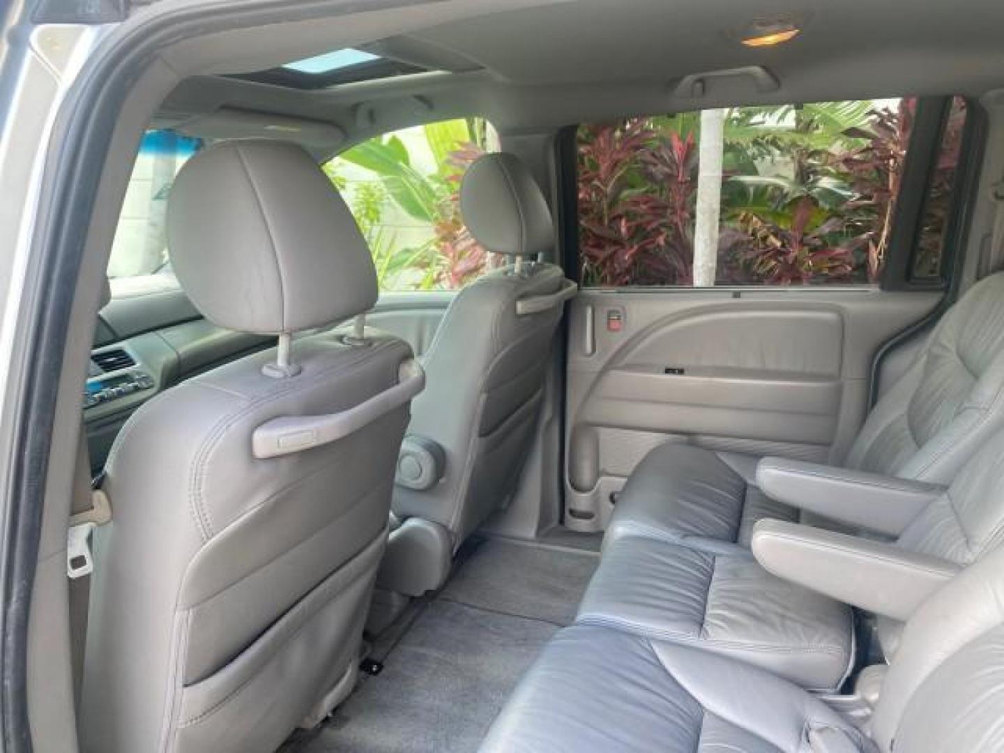 2010 Slate Green Metallic /Gray Honda Odyssey EX-L LOW MILES 52,543 1 OWNER FL (5FNRL3H62AB) with an 3.5L SOHC MPFI 24-Valve i-VTEC V6 Engine engine, Automatic transmission, located at 4701 North Dixie Hwy, Pompano Beach, FL, 33064, (954) 422-2889, 26.240938, -80.123474 - OUR WEBPAGE FLORIDACARS1.COM HAS OVER 100 PHOTOS AND FREE CARFAX LINK 2010 HONDA ODYSSEY EX-L VIN: 5FNRL3H62AB112651 5 F N R L 3 H 6 2 A B 1 1 2 6 5 1 VAN 3.5L V6 F SOHC 24V GASOLINE FRONT WHEEL DRIVE Features ABS Brakes Air Conditioning Alloy Wheels AM/FM Stereo Automatic Transmission Auxiliary Aud - Photo#72