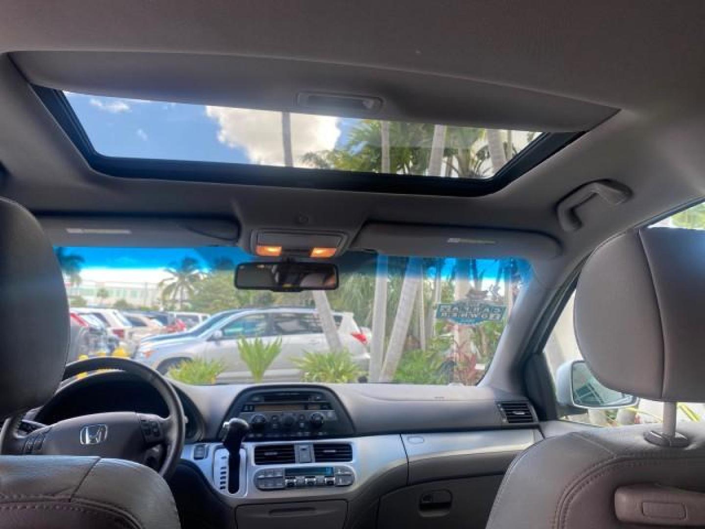 2010 Slate Green Metallic /Gray Honda Odyssey EX-L LOW MILES 52,543 1 OWNER FL (5FNRL3H62AB) with an 3.5L SOHC MPFI 24-Valve i-VTEC V6 Engine engine, Automatic transmission, located at 4701 North Dixie Hwy, Pompano Beach, FL, 33064, (954) 422-2889, 26.240938, -80.123474 - OUR WEBPAGE FLORIDACARS1.COM HAS OVER 100 PHOTOS AND FREE CARFAX LINK 2010 HONDA ODYSSEY EX-L VIN: 5FNRL3H62AB112651 5 F N R L 3 H 6 2 A B 1 1 2 6 5 1 VAN 3.5L V6 F SOHC 24V GASOLINE FRONT WHEEL DRIVE Features ABS Brakes Air Conditioning Alloy Wheels AM/FM Stereo Automatic Transmission Auxiliary Aud - Photo#74