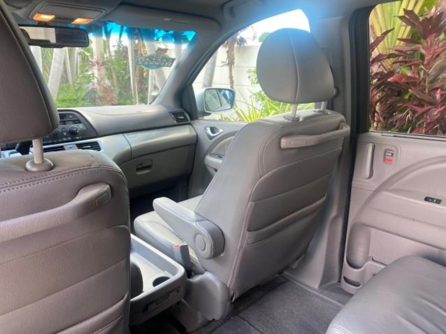 2010 Slate Green Metallic /Gray Honda Odyssey EX-L LOW MILES 52,543 1 OWNER FL (5FNRL3H62AB) with an 3.5L SOHC MPFI 24-Valve i-VTEC V6 Engine engine, Automatic transmission, located at 4701 North Dixie Hwy, Pompano Beach, FL, 33064, (954) 422-2889, 26.240938, -80.123474 - OUR WEBPAGE FLORIDACARS1.COM HAS OVER 100 PHOTOS AND FREE CARFAX LINK 2010 HONDA ODYSSEY EX-L VIN: 5FNRL3H62AB112651 5 F N R L 3 H 6 2 A B 1 1 2 6 5 1 VAN 3.5L V6 F SOHC 24V GASOLINE FRONT WHEEL DRIVE Features ABS Brakes Air Conditioning Alloy Wheels AM/FM Stereo Automatic Transmission Auxiliary Aud - Photo#75