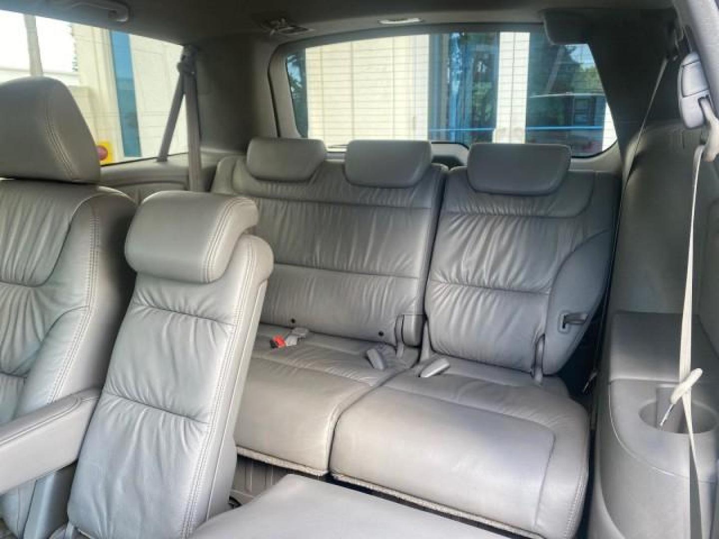 2010 Slate Green Metallic /Gray Honda Odyssey EX-L LOW MILES 52,543 1 OWNER FL (5FNRL3H62AB) with an 3.5L SOHC MPFI 24-Valve i-VTEC V6 Engine engine, Automatic transmission, located at 4701 North Dixie Hwy, Pompano Beach, FL, 33064, (954) 422-2889, 26.240938, -80.123474 - OUR WEBPAGE FLORIDACARS1.COM HAS OVER 100 PHOTOS AND FREE CARFAX LINK 2010 HONDA ODYSSEY EX-L VIN: 5FNRL3H62AB112651 5 F N R L 3 H 6 2 A B 1 1 2 6 5 1 VAN 3.5L V6 F SOHC 24V GASOLINE FRONT WHEEL DRIVE Features ABS Brakes Air Conditioning Alloy Wheels AM/FM Stereo Automatic Transmission Auxiliary Aud - Photo#77