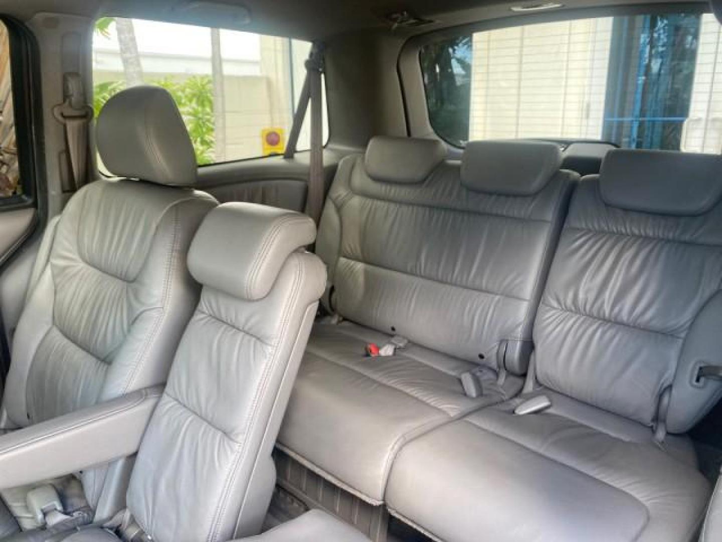 2010 Slate Green Metallic /Gray Honda Odyssey EX-L LOW MILES 52,543 1 OWNER FL (5FNRL3H62AB) with an 3.5L SOHC MPFI 24-Valve i-VTEC V6 Engine engine, Automatic transmission, located at 4701 North Dixie Hwy, Pompano Beach, FL, 33064, (954) 422-2889, 26.240938, -80.123474 - OUR WEBPAGE FLORIDACARS1.COM HAS OVER 100 PHOTOS AND FREE CARFAX LINK 2010 HONDA ODYSSEY EX-L VIN: 5FNRL3H62AB112651 5 F N R L 3 H 6 2 A B 1 1 2 6 5 1 VAN 3.5L V6 F SOHC 24V GASOLINE FRONT WHEEL DRIVE Features ABS Brakes Air Conditioning Alloy Wheels AM/FM Stereo Automatic Transmission Auxiliary Aud - Photo#78