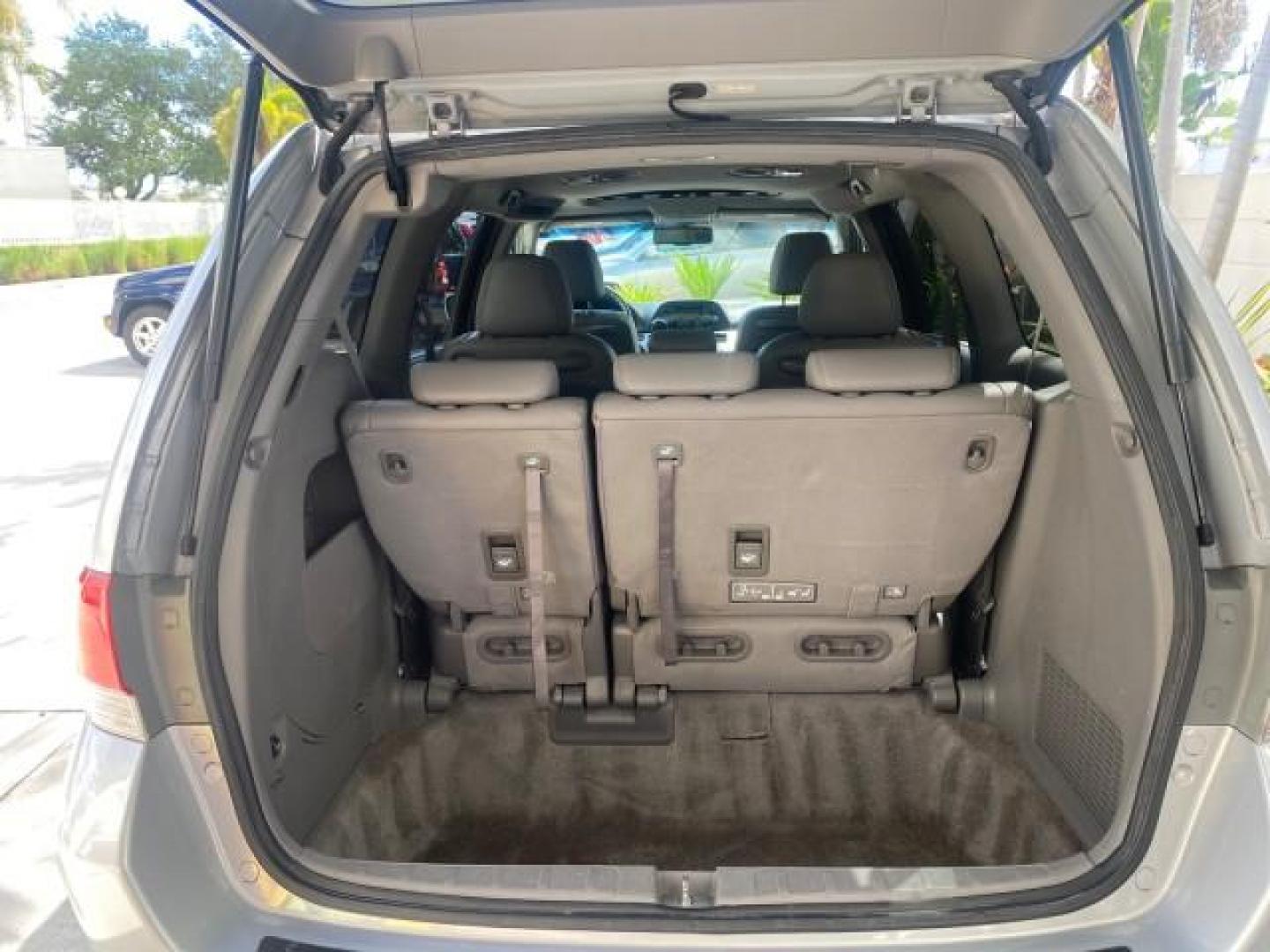 2010 Slate Green Metallic /Gray Honda Odyssey EX-L LOW MILES 52,543 1 OWNER FL (5FNRL3H62AB) with an 3.5L SOHC MPFI 24-Valve i-VTEC V6 Engine engine, Automatic transmission, located at 4701 North Dixie Hwy, Pompano Beach, FL, 33064, (954) 422-2889, 26.240938, -80.123474 - OUR WEBPAGE FLORIDACARS1.COM HAS OVER 100 PHOTOS AND FREE CARFAX LINK 2010 HONDA ODYSSEY EX-L VIN: 5FNRL3H62AB112651 5 F N R L 3 H 6 2 A B 1 1 2 6 5 1 VAN 3.5L V6 F SOHC 24V GASOLINE FRONT WHEEL DRIVE Features ABS Brakes Air Conditioning Alloy Wheels AM/FM Stereo Automatic Transmission Auxiliary Aud - Photo#90