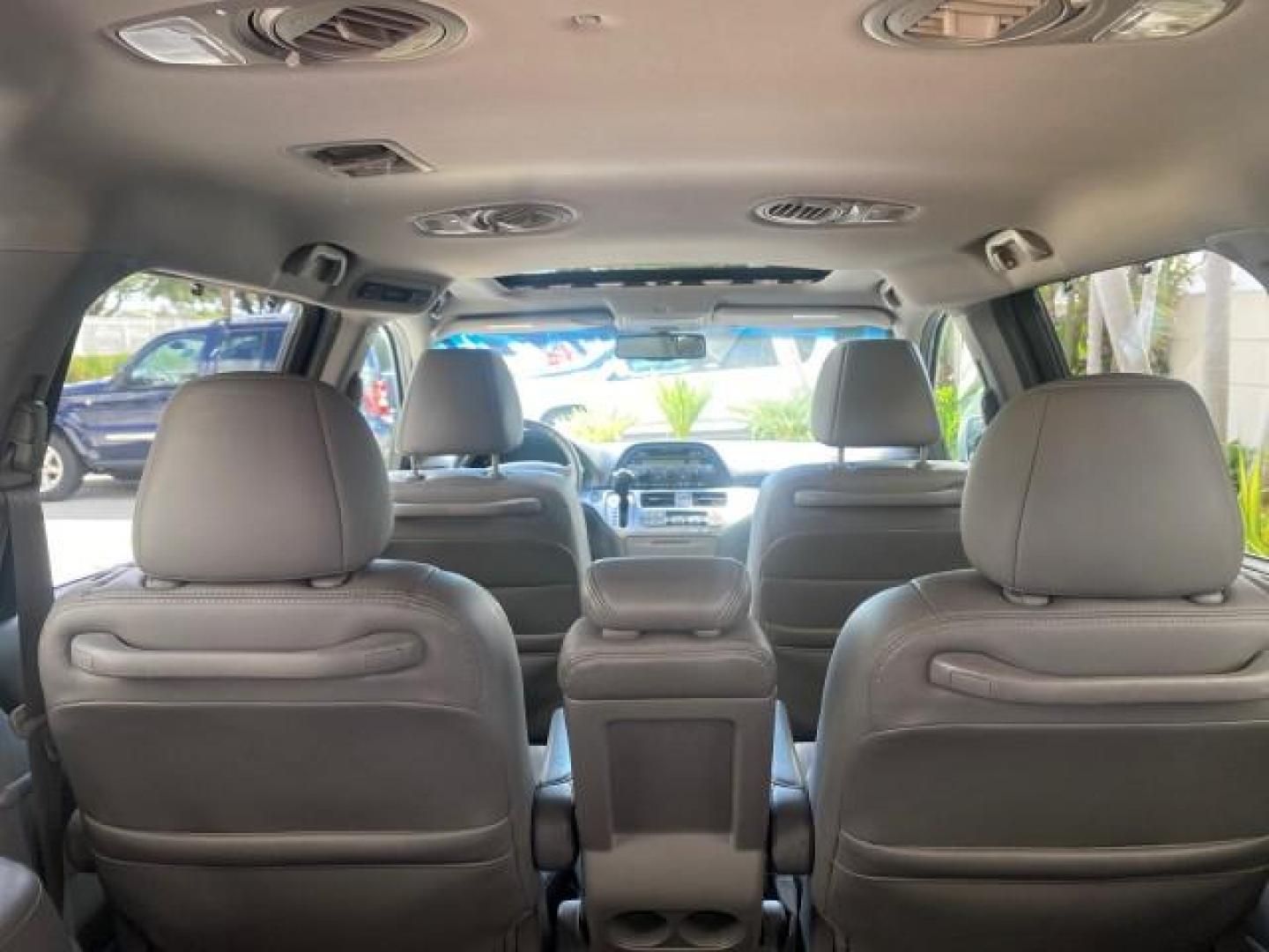 2010 Slate Green Metallic /Gray Honda Odyssey EX-L LOW MILES 52,543 1 OWNER FL (5FNRL3H62AB) with an 3.5L SOHC MPFI 24-Valve i-VTEC V6 Engine engine, Automatic transmission, located at 4701 North Dixie Hwy, Pompano Beach, FL, 33064, (954) 422-2889, 26.240938, -80.123474 - OUR WEBPAGE FLORIDACARS1.COM HAS OVER 100 PHOTOS AND FREE CARFAX LINK 2010 HONDA ODYSSEY EX-L VIN: 5FNRL3H62AB112651 5 F N R L 3 H 6 2 A B 1 1 2 6 5 1 VAN 3.5L V6 F SOHC 24V GASOLINE FRONT WHEEL DRIVE Features ABS Brakes Air Conditioning Alloy Wheels AM/FM Stereo Automatic Transmission Auxiliary Aud - Photo#92