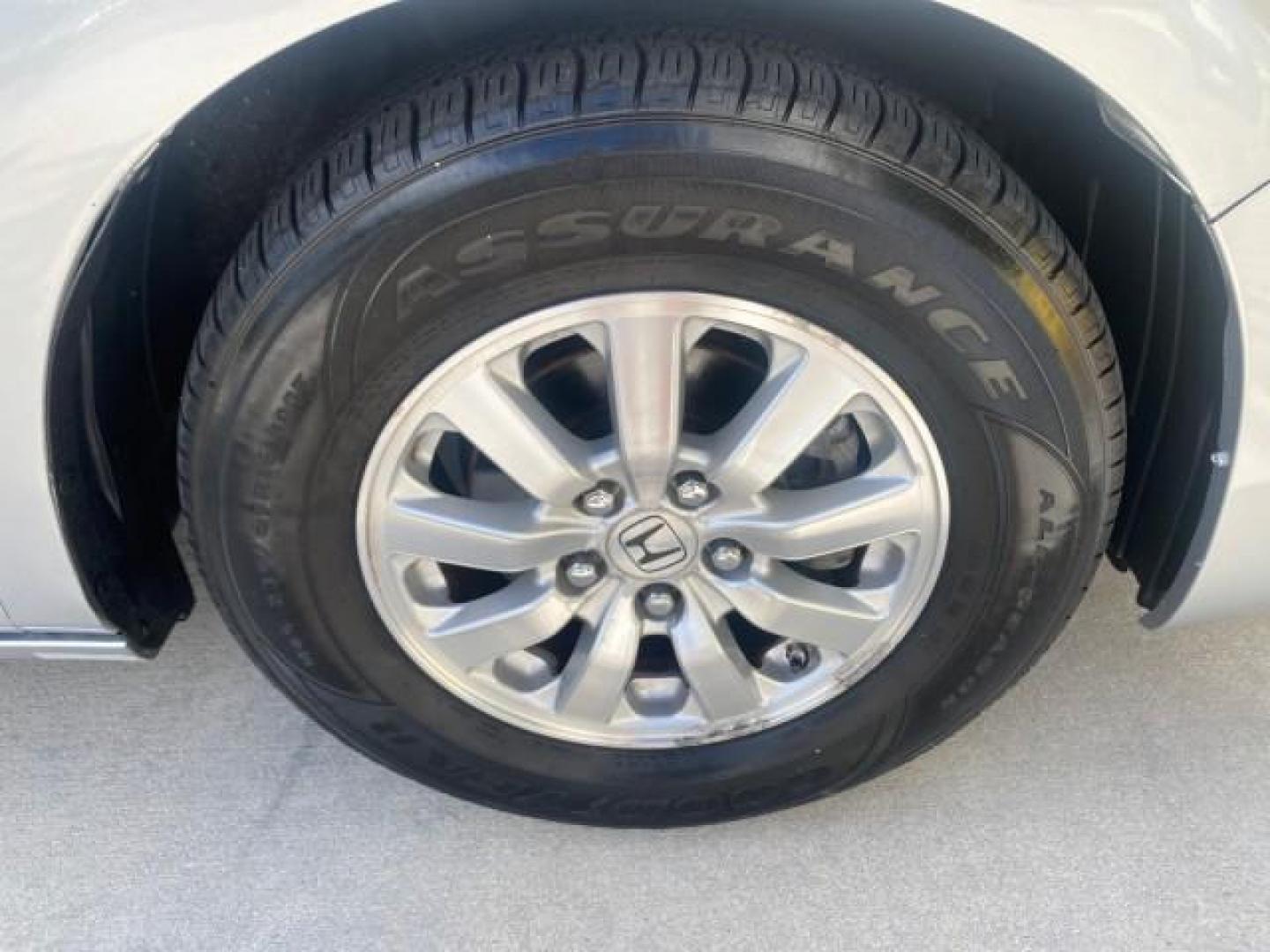 2010 Slate Green Metallic /Gray Honda Odyssey EX-L LOW MILES 52,543 1 OWNER FL (5FNRL3H62AB) with an 3.5L SOHC MPFI 24-Valve i-VTEC V6 Engine engine, Automatic transmission, located at 4701 North Dixie Hwy, Pompano Beach, FL, 33064, (954) 422-2889, 26.240938, -80.123474 - OUR WEBPAGE FLORIDACARS1.COM HAS OVER 100 PHOTOS AND FREE CARFAX LINK 2010 HONDA ODYSSEY EX-L VIN: 5FNRL3H62AB112651 5 F N R L 3 H 6 2 A B 1 1 2 6 5 1 VAN 3.5L V6 F SOHC 24V GASOLINE FRONT WHEEL DRIVE Features ABS Brakes Air Conditioning Alloy Wheels AM/FM Stereo Automatic Transmission Auxiliary Aud - Photo#94