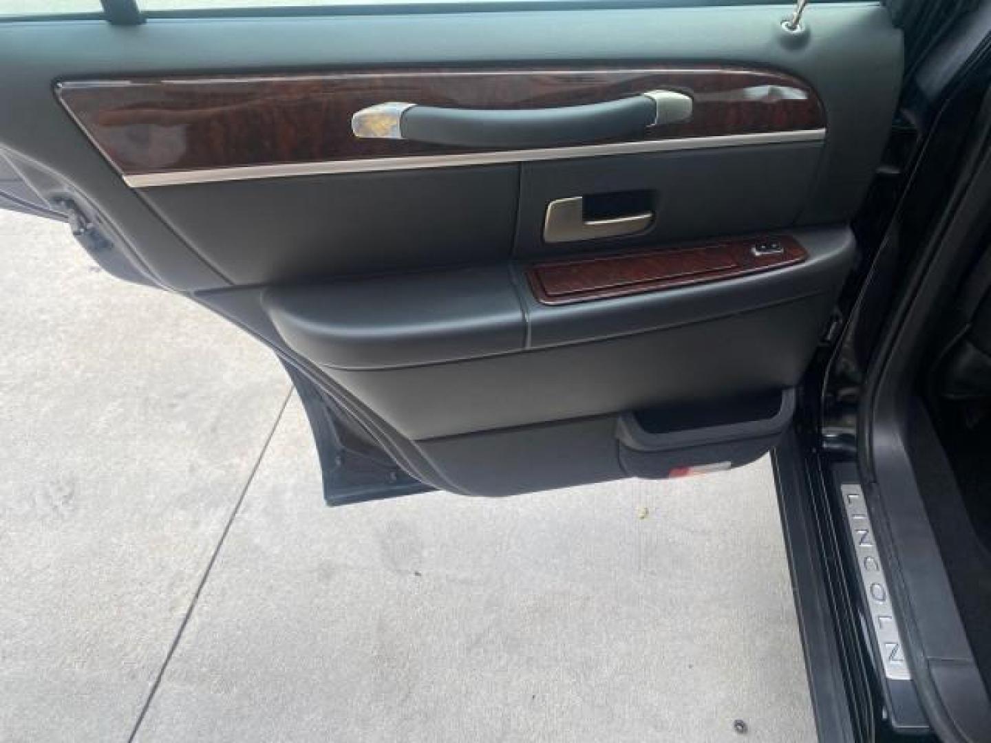 2008 Black /Black Lincoln Town Car Limited LOW MILES 70,308 BLACK (2LNHM82W08X) with an 4.6L SOHC EFI V8 Engine engine, Automatic transmission, located at 4701 North Dixie Hwy, Pompano Beach, FL, 33064, (954) 422-2889, 26.240938, -80.123474 - OUR WEBPAGE FLORIDACARS1.COM HAS OVER 100 PHOTOS AND FREE CARFAX LINK 2008 LINCOLN TOWN CAR SIGNATURE LIMITED VIN: 2LNHM82W08X641102 2 L N H M 8 2 W 0 8 X 6 4 1 1 0 2 SEDAN 4 DR 4.6L V8 F SOHC GASOLINE REAR WHEEL DRIVE Features ABS Brakes Air Conditioning Alloy Wheels AM/FM Stereo Automatic Transmis - Photo#61