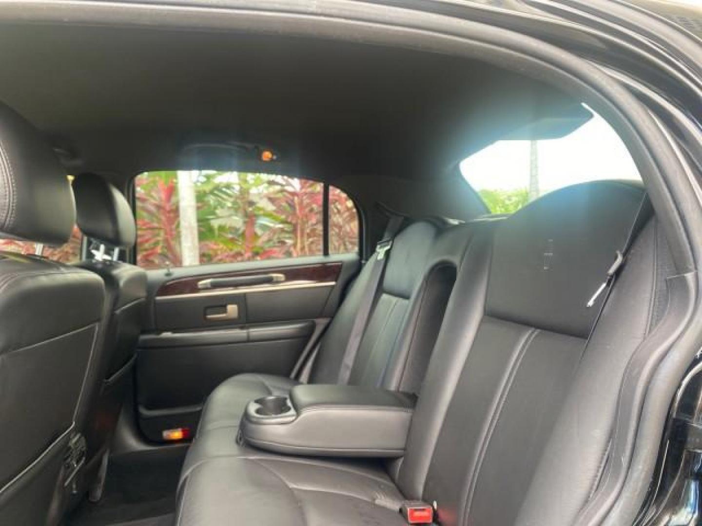 2008 Black /Black Lincoln Town Car Limited LOW MILES 70,308 BLACK (2LNHM82W08X) with an 4.6L SOHC EFI V8 Engine engine, Automatic transmission, located at 4701 North Dixie Hwy, Pompano Beach, FL, 33064, (954) 422-2889, 26.240938, -80.123474 - OUR WEBPAGE FLORIDACARS1.COM HAS OVER 100 PHOTOS AND FREE CARFAX LINK 2008 LINCOLN TOWN CAR SIGNATURE LIMITED VIN: 2LNHM82W08X641102 2 L N H M 8 2 W 0 8 X 6 4 1 1 0 2 SEDAN 4 DR 4.6L V8 F SOHC GASOLINE REAR WHEEL DRIVE Features ABS Brakes Air Conditioning Alloy Wheels AM/FM Stereo Automatic Transmis - Photo#62