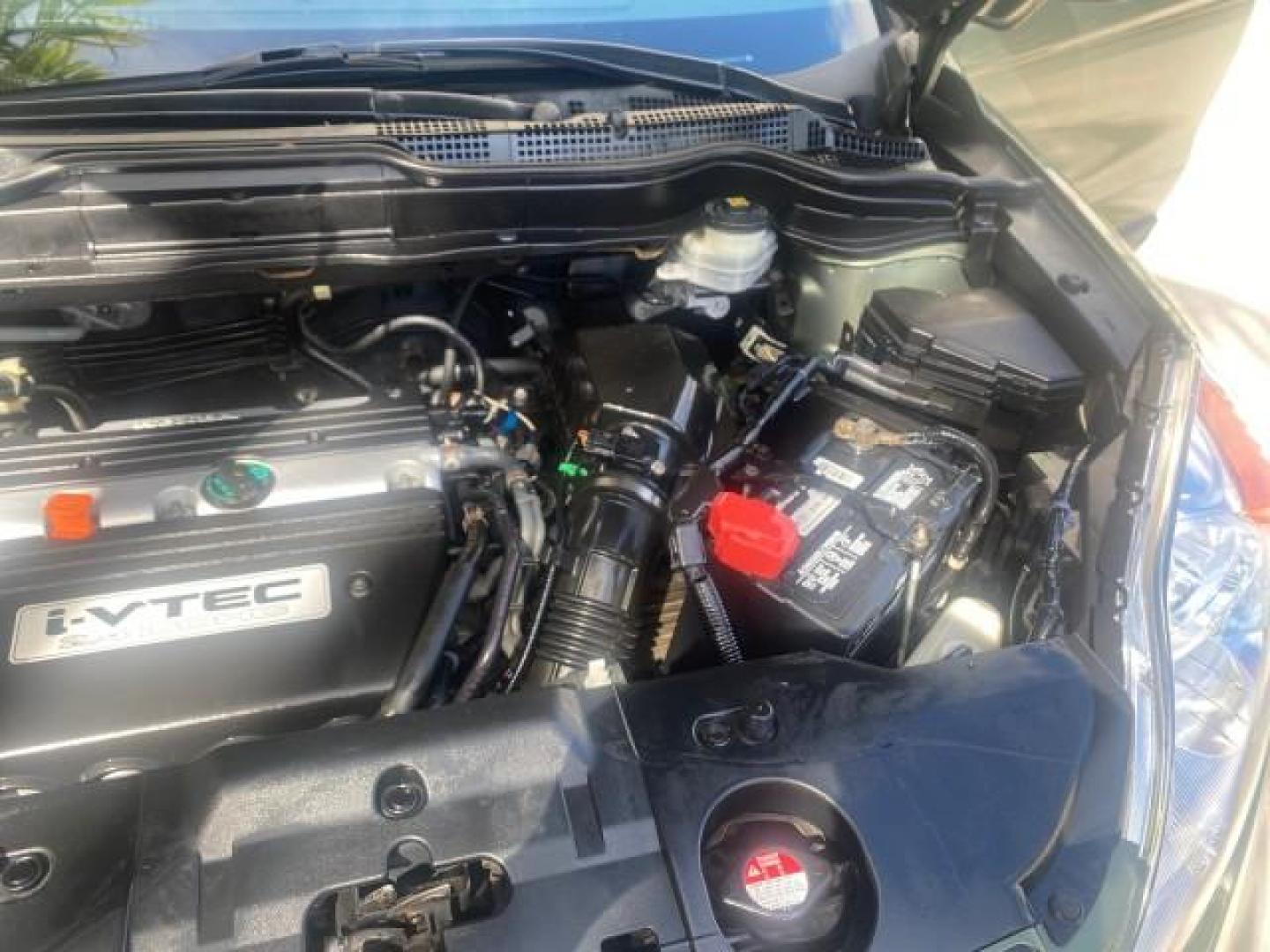 2009 Green Tea Metallic /Ivory Honda CR-V LX 1 OWNER LOW MILES 14,629 (5J6RE38349L) with an 2.4L DOHC MPFI 16-Valve i-VTEC I4 Engine engine, Automatic transmission, located at 4701 North Dixie Hwy, Pompano Beach, FL, 33064, (954) 422-2889, 26.240938, -80.123474 - OUR WEBPAGE FLORIDACARS1.COM HAS OVER 100 PHOTOS AND FREE CARFAX LINK 2009 HONDA CR-V LX VIN: 5J6RE38349L028673 5 J 6 R E 3 8 3 4 9 L 0 2 8 6 7 3 4 DOOR WAGON/SPORT UTILITY 2.4L I4 F DOHC 16V GASOLINE FRONT WHEEL DRIVE Presenting one of the finest Honda CR-V's weve ever listed! This incredible 1-own - Photo#26