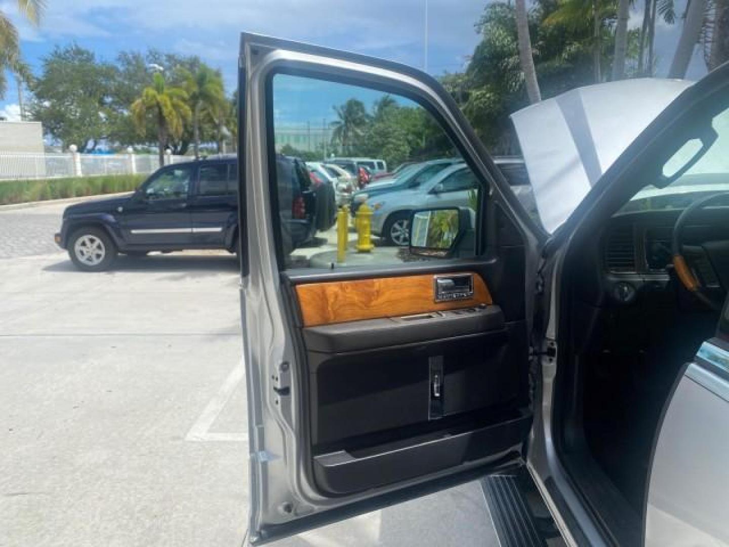 2011 White Platinum Tri-Coat Metallic /Stone Lincoln Navigator 1 OWNER FLORIDA SUNROOF (5LMJJ2H50BE) with an 5.4L SOHC 24-Valve V8 FFV Engine engine, Automatic transmission, located at 4701 North Dixie Hwy, Pompano Beach, FL, 33064, (954) 422-2889, 26.240938, -80.123474 - OUR WEBPAGE FLORIDACARS1.COM HAS OVER 100 PHOTOS AND FREE CARFAX LINK 2011 LINCOLN NAVIGATOR VIN: 5LMJJ2H50BEJ08212 5 L M J J 2 H 5 0 B E J 0 8 2 1 2 4 DOOR WAGON/SPORT UTILITY 5.4L V8 F SOHC 24V FLEX FUEL REAR WHEEL DRIVE Features A/C Seat(s) ABS Brakes Air Conditioning Alloy Wheels AM/FM Stereo Au - Photo#9