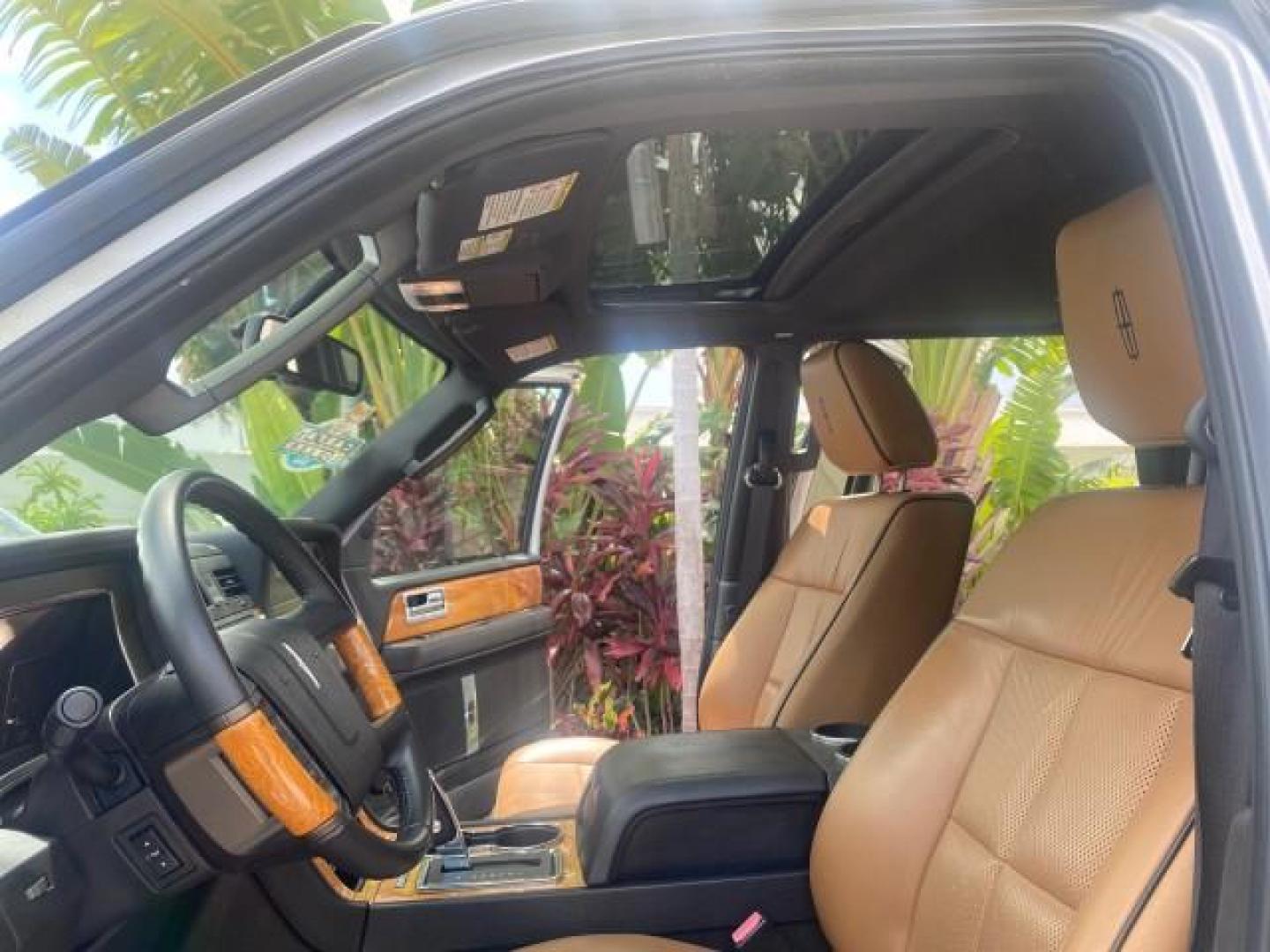 2011 White Platinum Tri-Coat Metallic /Stone Lincoln Navigator 1 OWNER FLORIDA SUNROOF (5LMJJ2H50BE) with an 5.4L SOHC 24-Valve V8 FFV Engine engine, Automatic transmission, located at 4701 North Dixie Hwy, Pompano Beach, FL, 33064, (954) 422-2889, 26.240938, -80.123474 - OUR WEBPAGE FLORIDACARS1.COM HAS OVER 100 PHOTOS AND FREE CARFAX LINK 2011 LINCOLN NAVIGATOR VIN: 5LMJJ2H50BEJ08212 5 L M J J 2 H 5 0 B E J 0 8 2 1 2 4 DOOR WAGON/SPORT UTILITY 5.4L V8 F SOHC 24V FLEX FUEL REAR WHEEL DRIVE Features A/C Seat(s) ABS Brakes Air Conditioning Alloy Wheels AM/FM Stereo Au - Photo#10