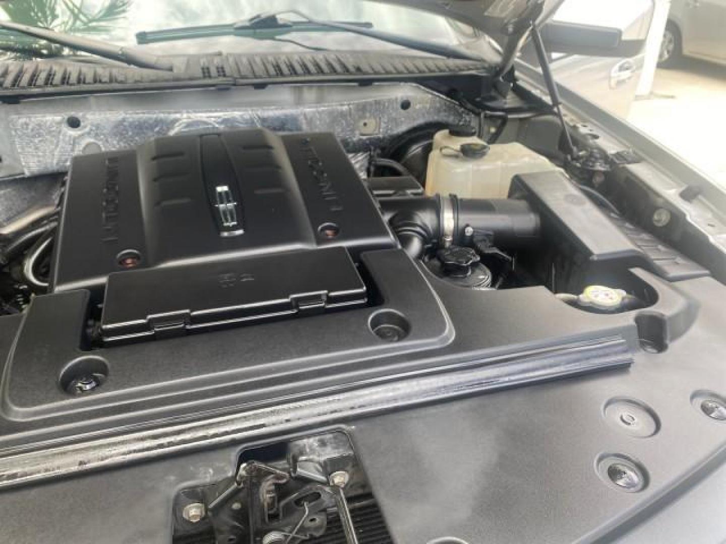 2011 White Platinum Tri-Coat Metallic /Stone Lincoln Navigator 1 OWNER FLORIDA SUNROOF (5LMJJ2H50BE) with an 5.4L SOHC 24-Valve V8 FFV Engine engine, Automatic transmission, located at 4701 North Dixie Hwy, Pompano Beach, FL, 33064, (954) 422-2889, 26.240938, -80.123474 - OUR WEBPAGE FLORIDACARS1.COM HAS OVER 100 PHOTOS AND FREE CARFAX LINK 2011 LINCOLN NAVIGATOR VIN: 5LMJJ2H50BEJ08212 5 L M J J 2 H 5 0 B E J 0 8 2 1 2 4 DOOR WAGON/SPORT UTILITY 5.4L V8 F SOHC 24V FLEX FUEL REAR WHEEL DRIVE Features A/C Seat(s) ABS Brakes Air Conditioning Alloy Wheels AM/FM Stereo Au - Photo#26