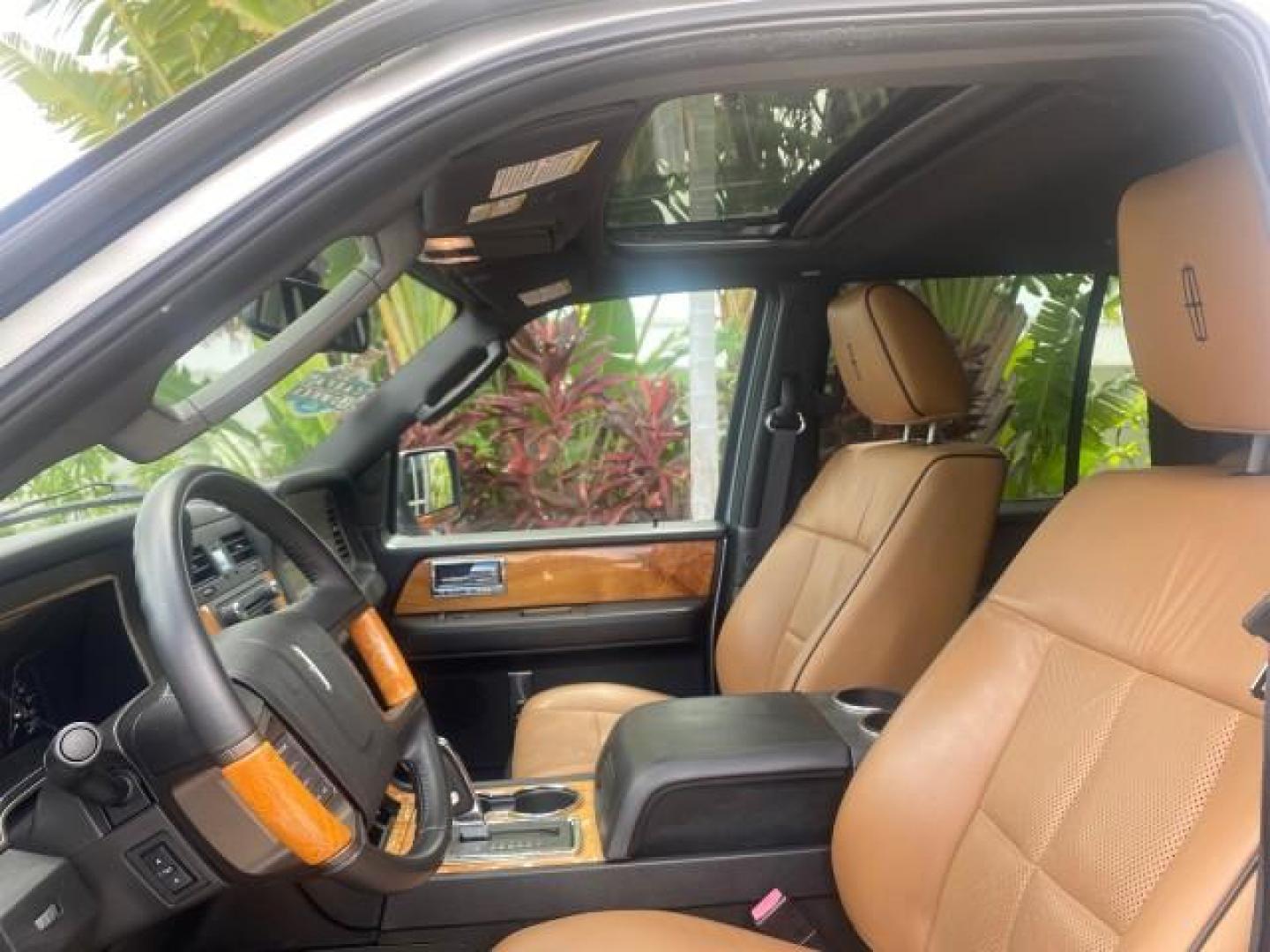 2011 White Platinum Tri-Coat Metallic /Stone Lincoln Navigator 1 OWNER FLORIDA SUNROOF (5LMJJ2H50BE) with an 5.4L SOHC 24-Valve V8 FFV Engine engine, Automatic transmission, located at 4701 North Dixie Hwy, Pompano Beach, FL, 33064, (954) 422-2889, 26.240938, -80.123474 - OUR WEBPAGE FLORIDACARS1.COM HAS OVER 100 PHOTOS AND FREE CARFAX LINK 2011 LINCOLN NAVIGATOR VIN: 5LMJJ2H50BEJ08212 5 L M J J 2 H 5 0 B E J 0 8 2 1 2 4 DOOR WAGON/SPORT UTILITY 5.4L V8 F SOHC 24V FLEX FUEL REAR WHEEL DRIVE Features A/C Seat(s) ABS Brakes Air Conditioning Alloy Wheels AM/FM Stereo Au - Photo#35