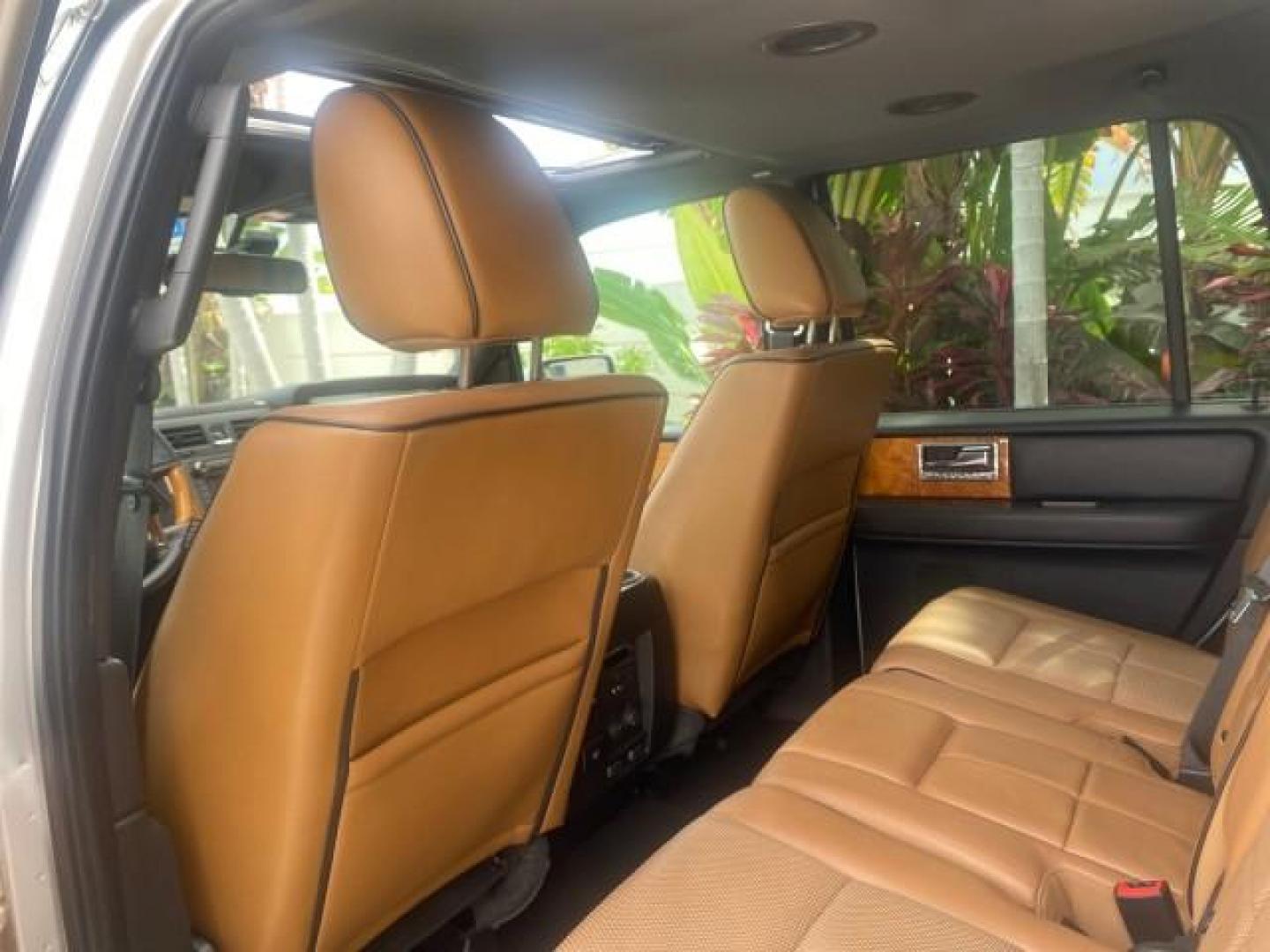 2011 White Platinum Tri-Coat Metallic /Stone Lincoln Navigator 1 OWNER FLORIDA SUNROOF (5LMJJ2H50BE) with an 5.4L SOHC 24-Valve V8 FFV Engine engine, Automatic transmission, located at 4701 North Dixie Hwy, Pompano Beach, FL, 33064, (954) 422-2889, 26.240938, -80.123474 - OUR WEBPAGE FLORIDACARS1.COM HAS OVER 100 PHOTOS AND FREE CARFAX LINK 2011 LINCOLN NAVIGATOR VIN: 5LMJJ2H50BEJ08212 5 L M J J 2 H 5 0 B E J 0 8 2 1 2 4 DOOR WAGON/SPORT UTILITY 5.4L V8 F SOHC 24V FLEX FUEL REAR WHEEL DRIVE Features A/C Seat(s) ABS Brakes Air Conditioning Alloy Wheels AM/FM Stereo Au - Photo#68