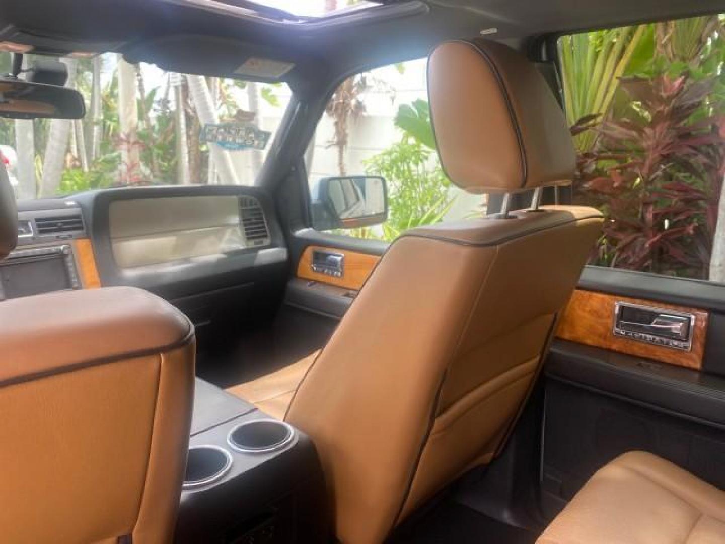 2011 White Platinum Tri-Coat Metallic /Stone Lincoln Navigator 1 OWNER FLORIDA SUNROOF (5LMJJ2H50BE) with an 5.4L SOHC 24-Valve V8 FFV Engine engine, Automatic transmission, located at 4701 North Dixie Hwy, Pompano Beach, FL, 33064, (954) 422-2889, 26.240938, -80.123474 - OUR WEBPAGE FLORIDACARS1.COM HAS OVER 100 PHOTOS AND FREE CARFAX LINK 2011 LINCOLN NAVIGATOR VIN: 5LMJJ2H50BEJ08212 5 L M J J 2 H 5 0 B E J 0 8 2 1 2 4 DOOR WAGON/SPORT UTILITY 5.4L V8 F SOHC 24V FLEX FUEL REAR WHEEL DRIVE Features A/C Seat(s) ABS Brakes Air Conditioning Alloy Wheels AM/FM Stereo Au - Photo#73