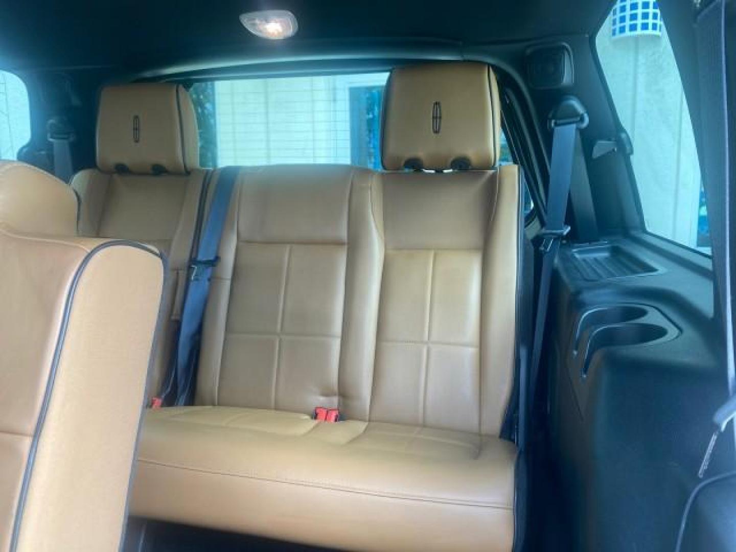 2011 White Platinum Tri-Coat Metallic /Stone Lincoln Navigator 1 OWNER FLORIDA SUNROOF (5LMJJ2H50BE) with an 5.4L SOHC 24-Valve V8 FFV Engine engine, Automatic transmission, located at 4701 North Dixie Hwy, Pompano Beach, FL, 33064, (954) 422-2889, 26.240938, -80.123474 - OUR WEBPAGE FLORIDACARS1.COM HAS OVER 100 PHOTOS AND FREE CARFAX LINK 2011 LINCOLN NAVIGATOR VIN: 5LMJJ2H50BEJ08212 5 L M J J 2 H 5 0 B E J 0 8 2 1 2 4 DOOR WAGON/SPORT UTILITY 5.4L V8 F SOHC 24V FLEX FUEL REAR WHEEL DRIVE Features A/C Seat(s) ABS Brakes Air Conditioning Alloy Wheels AM/FM Stereo Au - Photo#74
