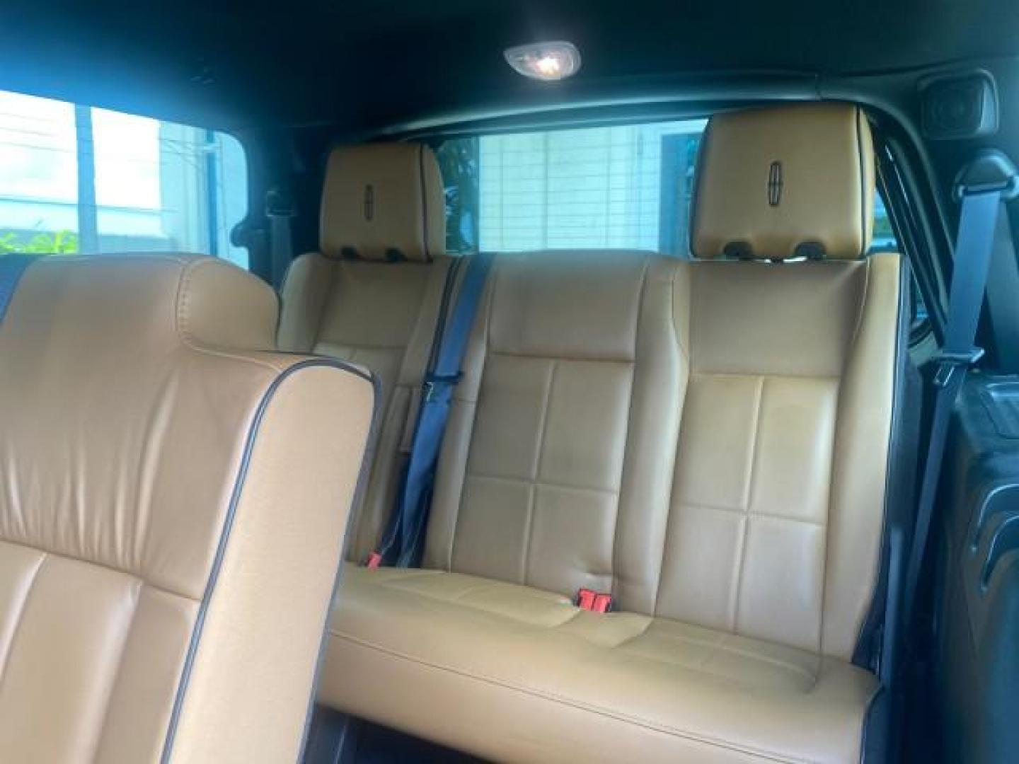 2011 White Platinum Tri-Coat Metallic /Stone Lincoln Navigator 1 OWNER FLORIDA SUNROOF (5LMJJ2H50BE) with an 5.4L SOHC 24-Valve V8 FFV Engine engine, Automatic transmission, located at 4701 North Dixie Hwy, Pompano Beach, FL, 33064, (954) 422-2889, 26.240938, -80.123474 - OUR WEBPAGE FLORIDACARS1.COM HAS OVER 100 PHOTOS AND FREE CARFAX LINK 2011 LINCOLN NAVIGATOR VIN: 5LMJJ2H50BEJ08212 5 L M J J 2 H 5 0 B E J 0 8 2 1 2 4 DOOR WAGON/SPORT UTILITY 5.4L V8 F SOHC 24V FLEX FUEL REAR WHEEL DRIVE Features A/C Seat(s) ABS Brakes Air Conditioning Alloy Wheels AM/FM Stereo Au - Photo#75
