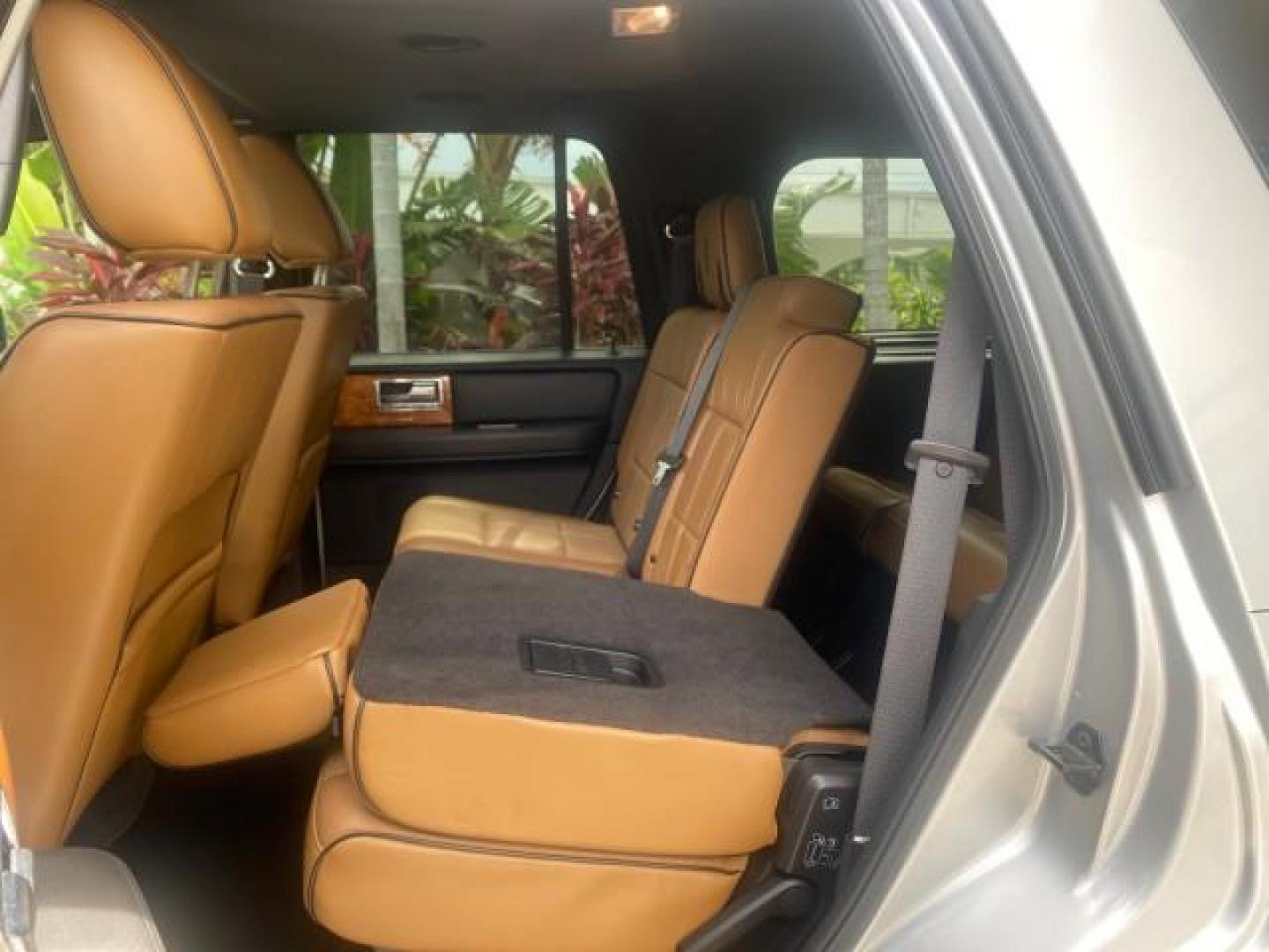 2011 White Platinum Tri-Coat Metallic /Stone Lincoln Navigator 1 OWNER FLORIDA SUNROOF (5LMJJ2H50BE) with an 5.4L SOHC 24-Valve V8 FFV Engine engine, Automatic transmission, located at 4701 North Dixie Hwy, Pompano Beach, FL, 33064, (954) 422-2889, 26.240938, -80.123474 - OUR WEBPAGE FLORIDACARS1.COM HAS OVER 100 PHOTOS AND FREE CARFAX LINK 2011 LINCOLN NAVIGATOR VIN: 5LMJJ2H50BEJ08212 5 L M J J 2 H 5 0 B E J 0 8 2 1 2 4 DOOR WAGON/SPORT UTILITY 5.4L V8 F SOHC 24V FLEX FUEL REAR WHEEL DRIVE Features A/C Seat(s) ABS Brakes Air Conditioning Alloy Wheels AM/FM Stereo Au - Photo#77