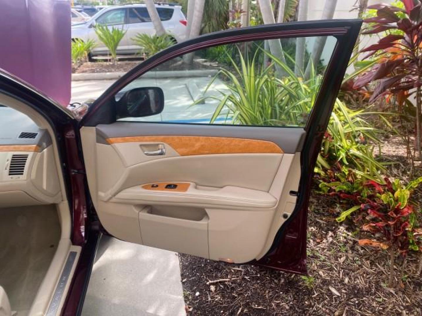 2006 Cassis Pearl /Ivory Toyota Avalon XLS LOW MILES 49,416 NAV SUNROOF (4T1BK36BX6U) with an 3.5L 24-Valve EFI DOHC V6 Engine engine, Automatic transmission, located at 4701 North Dixie Hwy, Pompano Beach, FL, 33064, (954) 422-2889, 26.240938, -80.123474 - OUR WEBPAGE FLORIDACARS1.COM HAS OVER 100 PHOTOS AND FREE CARFAX LINK 2006 TOYOTA AVALON XLS 31 MPG!! VIN: 4T1BK36BX6U147470 4 T 1 B K 3 6 B X 6 U 1 4 7 4 7 0 SEDAN 4 DR 3.5L V6 F DOHC 24V GASOLINE FRONT WHEEL DRIVE Features A/C Seat(s) ABS Brakes Air Conditioning Alloy Wheels AM/FM Stereo Automated - Photo#11