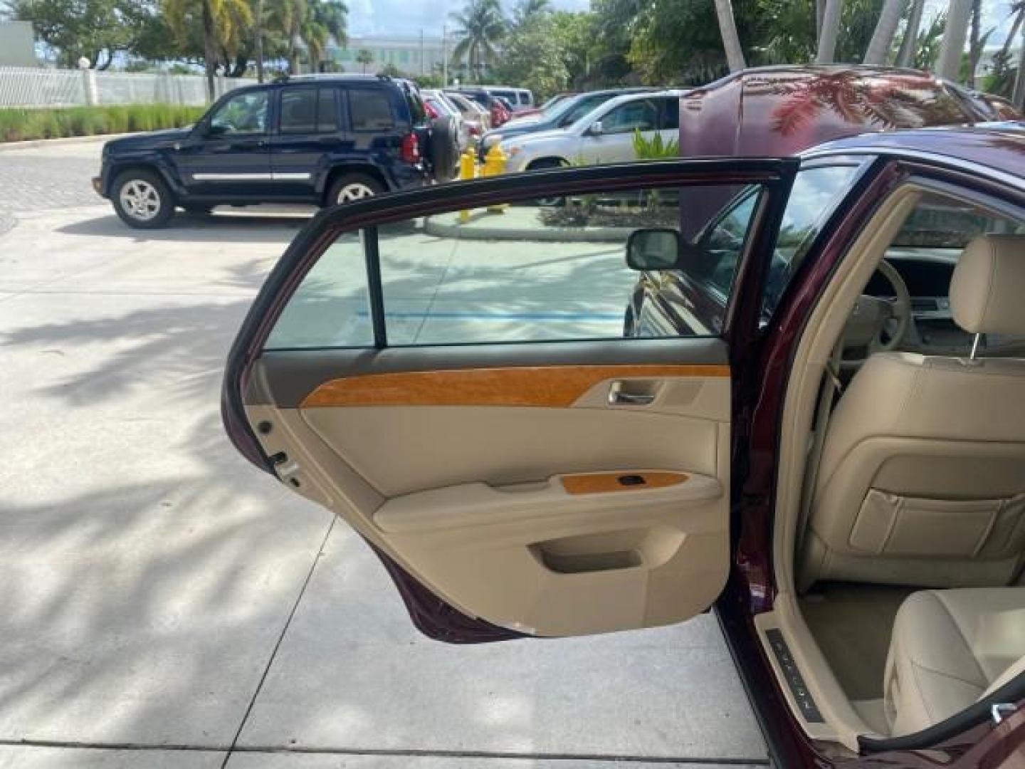 2006 Cassis Pearl /Ivory Toyota Avalon XLS LOW MILES 49,416 NAV SUNROOF (4T1BK36BX6U) with an 3.5L 24-Valve EFI DOHC V6 Engine engine, Automatic transmission, located at 4701 North Dixie Hwy, Pompano Beach, FL, 33064, (954) 422-2889, 26.240938, -80.123474 - OUR WEBPAGE FLORIDACARS1.COM HAS OVER 100 PHOTOS AND FREE CARFAX LINK 2006 TOYOTA AVALON XLS 31 MPG!! VIN: 4T1BK36BX6U147470 4 T 1 B K 3 6 B X 6 U 1 4 7 4 7 0 SEDAN 4 DR 3.5L V6 F DOHC 24V GASOLINE FRONT WHEEL DRIVE Features A/C Seat(s) ABS Brakes Air Conditioning Alloy Wheels AM/FM Stereo Automated - Photo#13