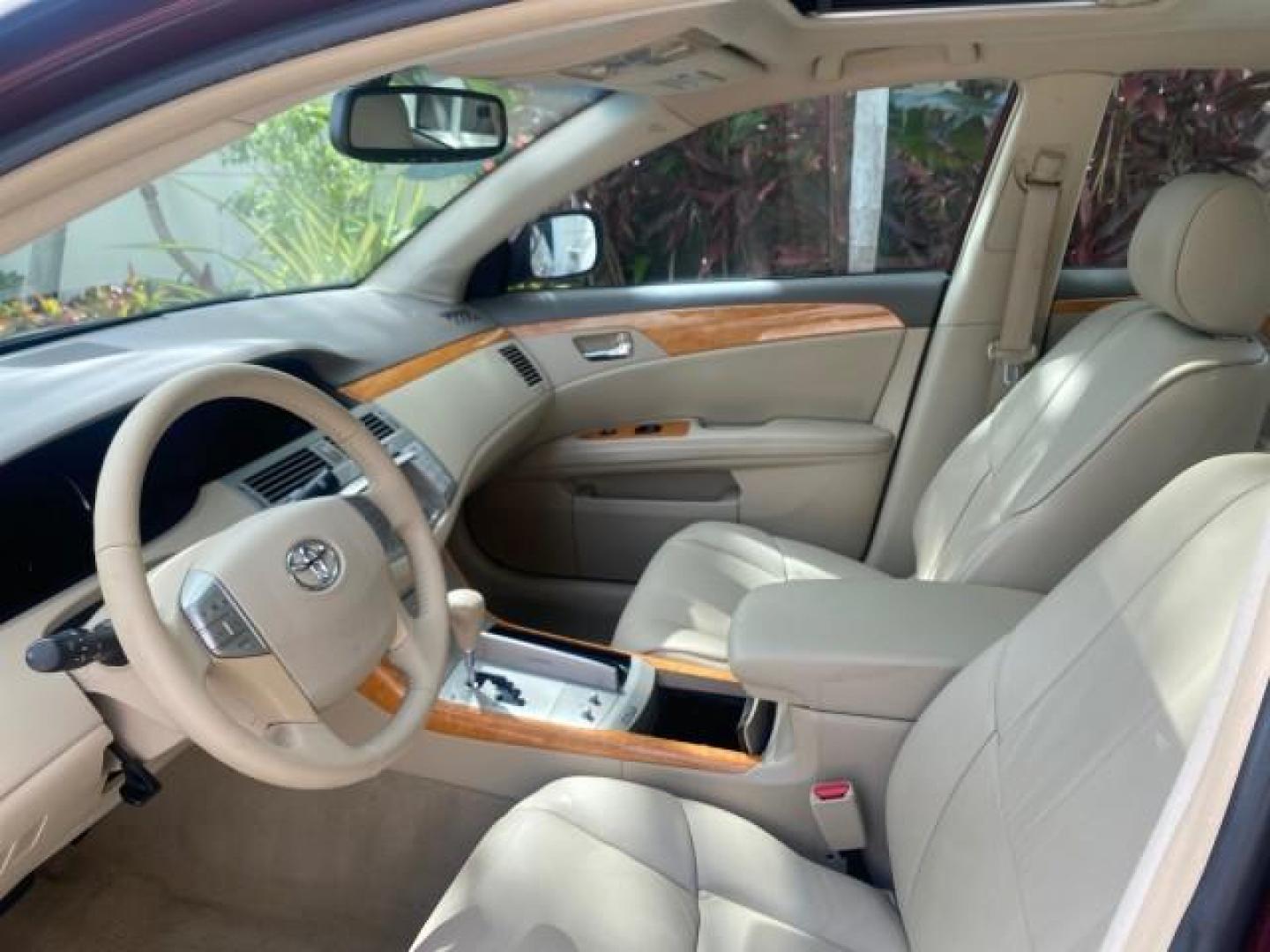 2006 Cassis Pearl /Ivory Toyota Avalon XLS LOW MILES 49,416 NAV SUNROOF (4T1BK36BX6U) with an 3.5L 24-Valve EFI DOHC V6 Engine engine, Automatic transmission, located at 4701 North Dixie Hwy, Pompano Beach, FL, 33064, (954) 422-2889, 26.240938, -80.123474 - OUR WEBPAGE FLORIDACARS1.COM HAS OVER 100 PHOTOS AND FREE CARFAX LINK 2006 TOYOTA AVALON XLS 31 MPG!! VIN: 4T1BK36BX6U147470 4 T 1 B K 3 6 B X 6 U 1 4 7 4 7 0 SEDAN 4 DR 3.5L V6 F DOHC 24V GASOLINE FRONT WHEEL DRIVE Features A/C Seat(s) ABS Brakes Air Conditioning Alloy Wheels AM/FM Stereo Automated - Photo#34