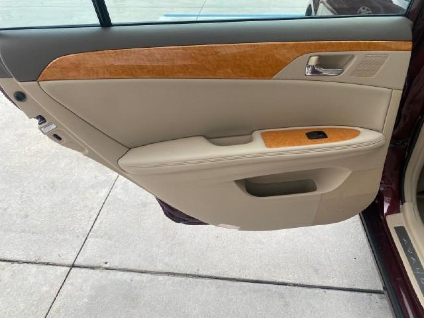 2006 Cassis Pearl /Ivory Toyota Avalon XLS LOW MILES 49,416 NAV SUNROOF (4T1BK36BX6U) with an 3.5L 24-Valve EFI DOHC V6 Engine engine, Automatic transmission, located at 4701 North Dixie Hwy, Pompano Beach, FL, 33064, (954) 422-2889, 26.240938, -80.123474 - OUR WEBPAGE FLORIDACARS1.COM HAS OVER 100 PHOTOS AND FREE CARFAX LINK 2006 TOYOTA AVALON XLS 31 MPG!! VIN: 4T1BK36BX6U147470 4 T 1 B K 3 6 B X 6 U 1 4 7 4 7 0 SEDAN 4 DR 3.5L V6 F DOHC 24V GASOLINE FRONT WHEEL DRIVE Features A/C Seat(s) ABS Brakes Air Conditioning Alloy Wheels AM/FM Stereo Automated - Photo#66
