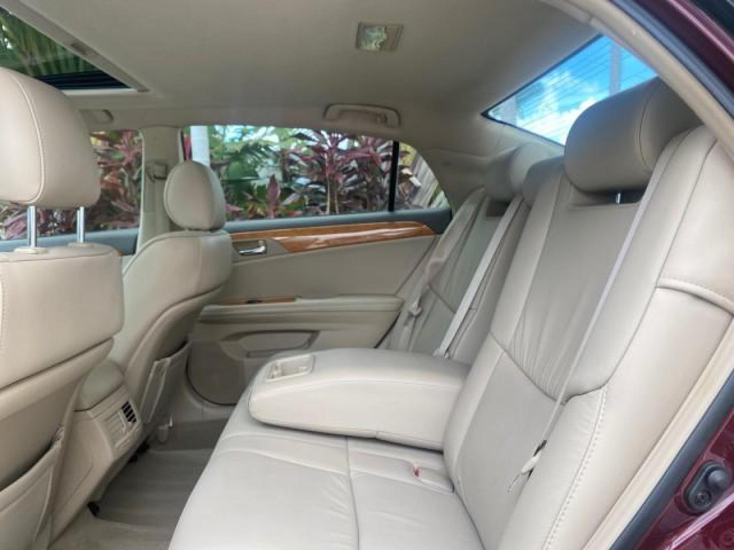 2006 Cassis Pearl /Ivory Toyota Avalon XLS LOW MILES 49,416 NAV SUNROOF (4T1BK36BX6U) with an 3.5L 24-Valve EFI DOHC V6 Engine engine, Automatic transmission, located at 4701 North Dixie Hwy, Pompano Beach, FL, 33064, (954) 422-2889, 26.240938, -80.123474 - OUR WEBPAGE FLORIDACARS1.COM HAS OVER 100 PHOTOS AND FREE CARFAX LINK 2006 TOYOTA AVALON XLS 31 MPG!! VIN: 4T1BK36BX6U147470 4 T 1 B K 3 6 B X 6 U 1 4 7 4 7 0 SEDAN 4 DR 3.5L V6 F DOHC 24V GASOLINE FRONT WHEEL DRIVE Features A/C Seat(s) ABS Brakes Air Conditioning Alloy Wheels AM/FM Stereo Automated - Photo#69