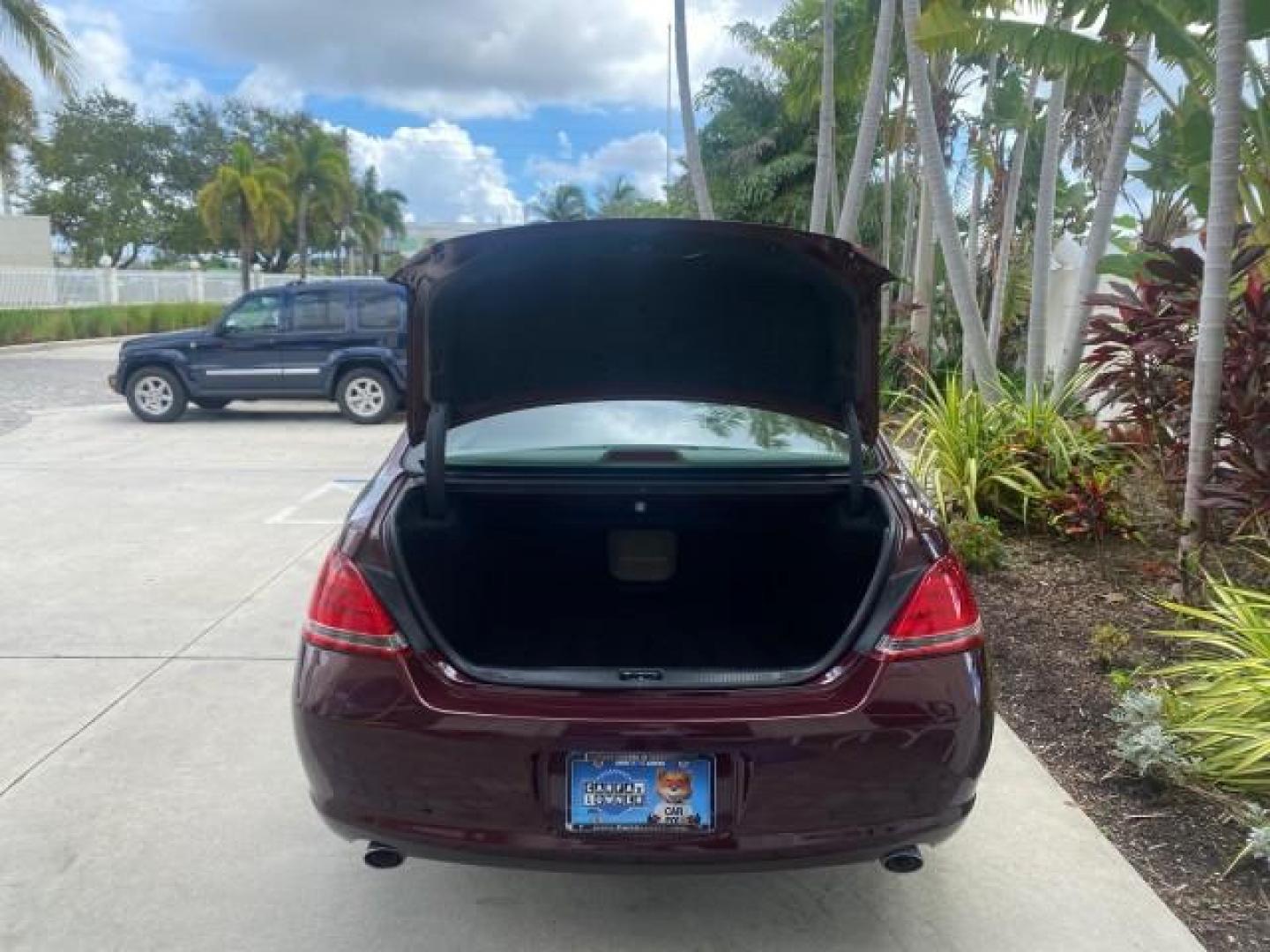 2006 Cassis Pearl /Ivory Toyota Avalon XLS LOW MILES 49,416 NAV SUNROOF (4T1BK36BX6U) with an 3.5L 24-Valve EFI DOHC V6 Engine engine, Automatic transmission, located at 4701 North Dixie Hwy, Pompano Beach, FL, 33064, (954) 422-2889, 26.240938, -80.123474 - OUR WEBPAGE FLORIDACARS1.COM HAS OVER 100 PHOTOS AND FREE CARFAX LINK 2006 TOYOTA AVALON XLS 31 MPG!! VIN: 4T1BK36BX6U147470 4 T 1 B K 3 6 B X 6 U 1 4 7 4 7 0 SEDAN 4 DR 3.5L V6 F DOHC 24V GASOLINE FRONT WHEEL DRIVE Features A/C Seat(s) ABS Brakes Air Conditioning Alloy Wheels AM/FM Stereo Automated - Photo#85