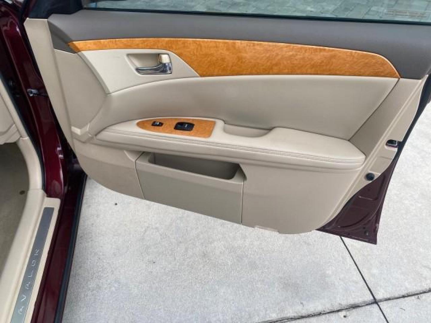 2006 Cassis Pearl /Ivory Toyota Avalon XLS LOW MILES 49,416 NAV SUNROOF (4T1BK36BX6U) with an 3.5L 24-Valve EFI DOHC V6 Engine engine, Automatic transmission, located at 4701 North Dixie Hwy, Pompano Beach, FL, 33064, (954) 422-2889, 26.240938, -80.123474 - OUR WEBPAGE FLORIDACARS1.COM HAS OVER 100 PHOTOS AND FREE CARFAX LINK 2006 TOYOTA AVALON XLS 31 MPG!! VIN: 4T1BK36BX6U147470 4 T 1 B K 3 6 B X 6 U 1 4 7 4 7 0 SEDAN 4 DR 3.5L V6 F DOHC 24V GASOLINE FRONT WHEEL DRIVE Features A/C Seat(s) ABS Brakes Air Conditioning Alloy Wheels AM/FM Stereo Automated - Photo#95