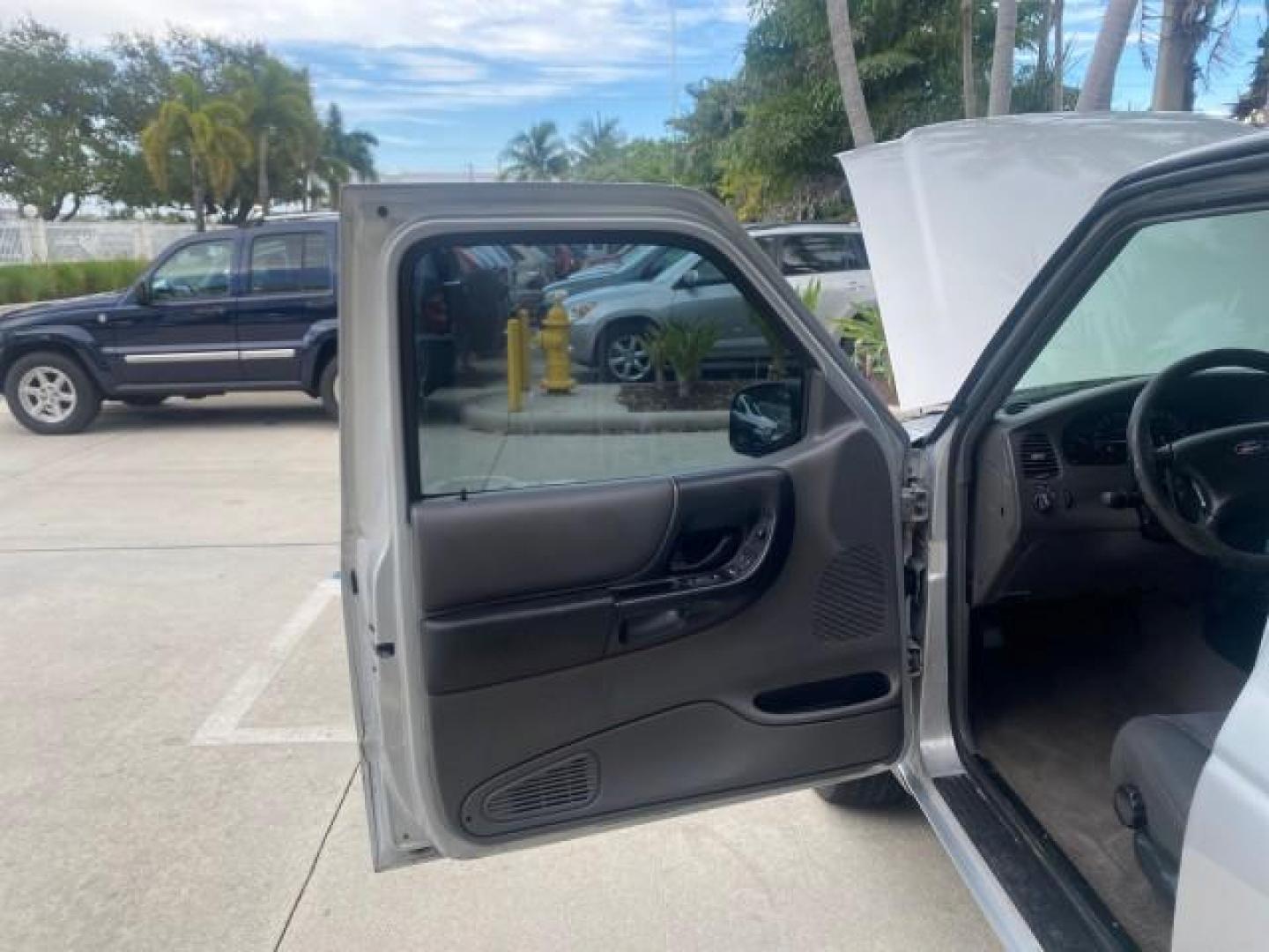 2002 Silver Frost Metallic /Dark Graphite Ford Ranger XLT 1 OWNER FLORIDA (1FTYR14U62P) with an 3.0L SEFI V6 Engine engine, Automatic transmission, located at 4701 North Dixie Hwy, Pompano Beach, FL, 33064, (954) 422-2889, 26.240938, -80.123474 - OUR WEBPAGE FLORIDACARS1.COM HAS OVER 100 PHOTOS AND FREE CARFAX LINK 2002 FORD RANGER EDGE VIN: 1FTYR14U62PA85366 1 F T Y R 1 4 U 6 2 P A 8 5 3 6 6 CLUB CAB PICKUP 3.0L V6 F OHV GASOLINE REAR WHEEL DRIVE Top Features Bed Liner Cloth Seats Tow Hitch Basic Features ABS Brakes Automatic Transmission C - Photo#9