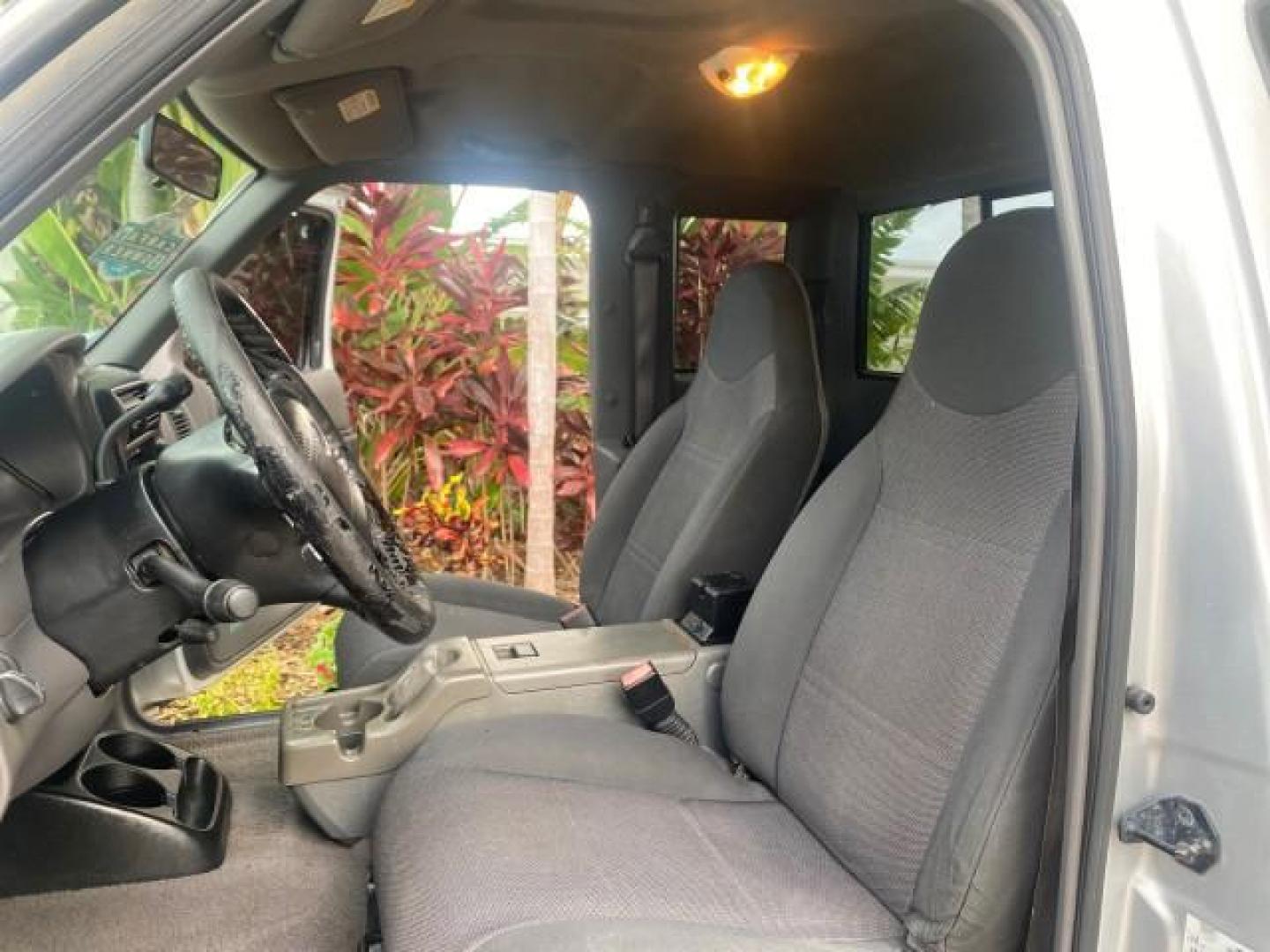 2002 Silver Frost Metallic /Dark Graphite Ford Ranger XLT 1 OWNER FLORIDA (1FTYR14U62P) with an 3.0L SEFI V6 Engine engine, Automatic transmission, located at 4701 North Dixie Hwy, Pompano Beach, FL, 33064, (954) 422-2889, 26.240938, -80.123474 - OUR WEBPAGE FLORIDACARS1.COM HAS OVER 100 PHOTOS AND FREE CARFAX LINK 2002 FORD RANGER EDGE VIN: 1FTYR14U62PA85366 1 F T Y R 1 4 U 6 2 P A 8 5 3 6 6 CLUB CAB PICKUP 3.0L V6 F OHV GASOLINE REAR WHEEL DRIVE Top Features Bed Liner Cloth Seats Tow Hitch Basic Features ABS Brakes Automatic Transmission C - Photo#10