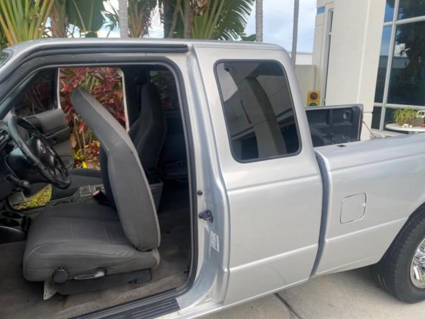 2002 Silver Frost Metallic /Dark Graphite Ford Ranger XLT 1 OWNER FLORIDA (1FTYR14U62P) with an 3.0L SEFI V6 Engine engine, Automatic transmission, located at 4701 North Dixie Hwy, Pompano Beach, FL, 33064, (954) 422-2889, 26.240938, -80.123474 - OUR WEBPAGE FLORIDACARS1.COM HAS OVER 100 PHOTOS AND FREE CARFAX LINK 2002 FORD RANGER EDGE VIN: 1FTYR14U62PA85366 1 F T Y R 1 4 U 6 2 P A 8 5 3 6 6 CLUB CAB PICKUP 3.0L V6 F OHV GASOLINE REAR WHEEL DRIVE Top Features Bed Liner Cloth Seats Tow Hitch Basic Features ABS Brakes Automatic Transmission C - Photo#13