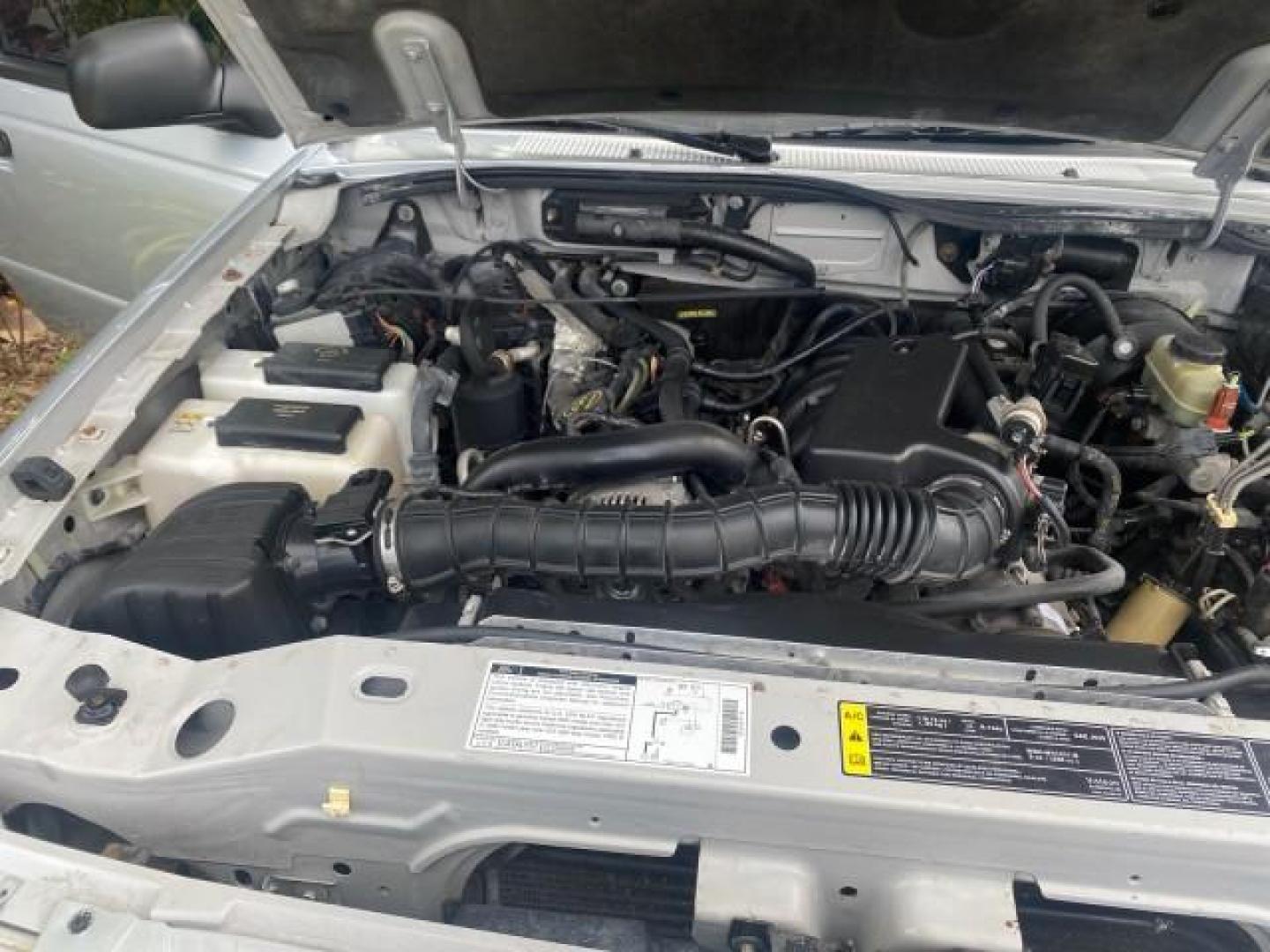 2002 Silver Frost Metallic /Dark Graphite Ford Ranger XLT 1 OWNER FLORIDA (1FTYR14U62P) with an 3.0L SEFI V6 Engine engine, Automatic transmission, located at 4701 North Dixie Hwy, Pompano Beach, FL, 33064, (954) 422-2889, 26.240938, -80.123474 - OUR WEBPAGE FLORIDACARS1.COM HAS OVER 100 PHOTOS AND FREE CARFAX LINK 2002 FORD RANGER EDGE VIN: 1FTYR14U62PA85366 1 F T Y R 1 4 U 6 2 P A 8 5 3 6 6 CLUB CAB PICKUP 3.0L V6 F OHV GASOLINE REAR WHEEL DRIVE Top Features Bed Liner Cloth Seats Tow Hitch Basic Features ABS Brakes Automatic Transmission C - Photo#25