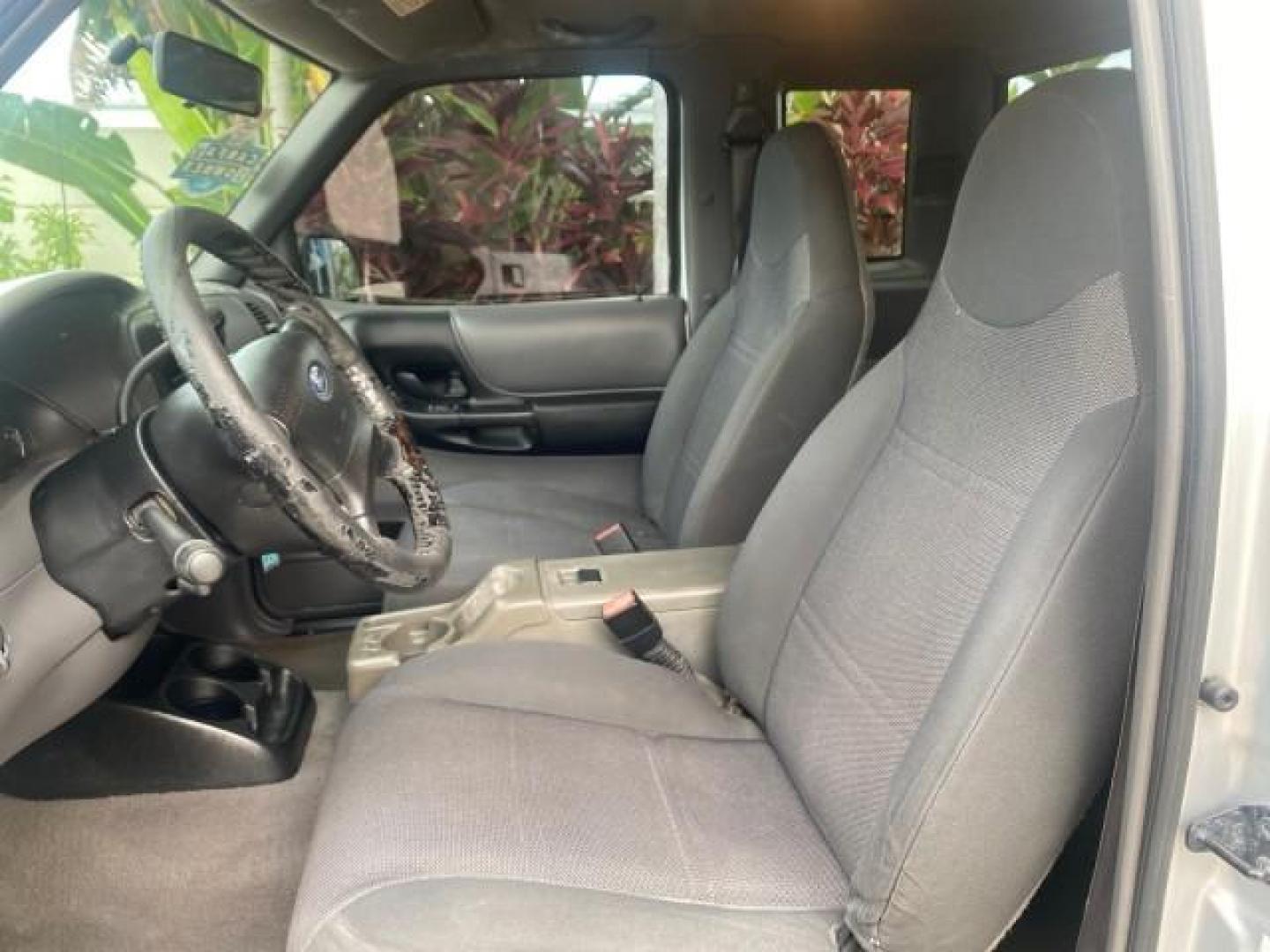 2002 Silver Frost Metallic /Dark Graphite Ford Ranger XLT 1 OWNER FLORIDA (1FTYR14U62P) with an 3.0L SEFI V6 Engine engine, Automatic transmission, located at 4701 North Dixie Hwy, Pompano Beach, FL, 33064, (954) 422-2889, 26.240938, -80.123474 - OUR WEBPAGE FLORIDACARS1.COM HAS OVER 100 PHOTOS AND FREE CARFAX LINK 2002 FORD RANGER EDGE VIN: 1FTYR14U62PA85366 1 F T Y R 1 4 U 6 2 P A 8 5 3 6 6 CLUB CAB PICKUP 3.0L V6 F OHV GASOLINE REAR WHEEL DRIVE Top Features Bed Liner Cloth Seats Tow Hitch Basic Features ABS Brakes Automatic Transmission C - Photo#34
