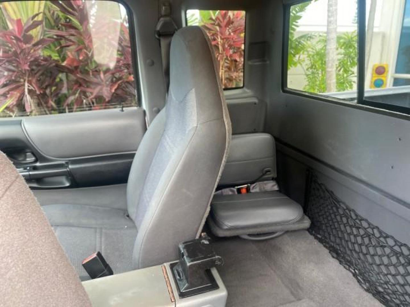 2002 Silver Frost Metallic /Dark Graphite Ford Ranger XLT 1 OWNER FLORIDA (1FTYR14U62P) with an 3.0L SEFI V6 Engine engine, Automatic transmission, located at 4701 North Dixie Hwy, Pompano Beach, FL, 33064, (954) 422-2889, 26.240938, -80.123474 - OUR WEBPAGE FLORIDACARS1.COM HAS OVER 100 PHOTOS AND FREE CARFAX LINK 2002 FORD RANGER EDGE VIN: 1FTYR14U62PA85366 1 F T Y R 1 4 U 6 2 P A 8 5 3 6 6 CLUB CAB PICKUP 3.0L V6 F OHV GASOLINE REAR WHEEL DRIVE Top Features Bed Liner Cloth Seats Tow Hitch Basic Features ABS Brakes Automatic Transmission C - Photo#63