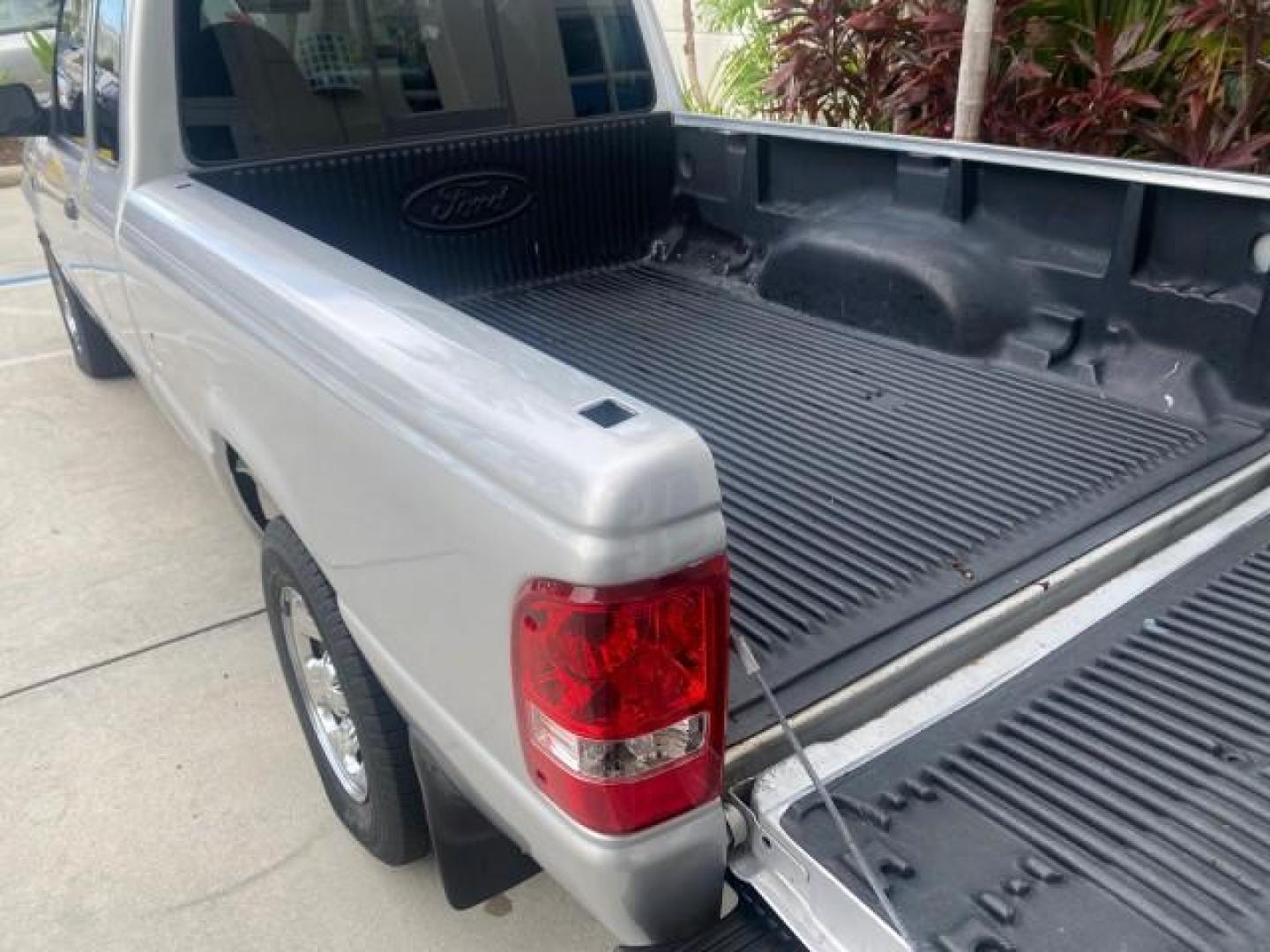 2002 Silver Frost Metallic /Dark Graphite Ford Ranger XLT 1 OWNER FLORIDA (1FTYR14U62P) with an 3.0L SEFI V6 Engine engine, Automatic transmission, located at 4701 North Dixie Hwy, Pompano Beach, FL, 33064, (954) 422-2889, 26.240938, -80.123474 - OUR WEBPAGE FLORIDACARS1.COM HAS OVER 100 PHOTOS AND FREE CARFAX LINK 2002 FORD RANGER EDGE VIN: 1FTYR14U62PA85366 1 F T Y R 1 4 U 6 2 P A 8 5 3 6 6 CLUB CAB PICKUP 3.0L V6 F OHV GASOLINE REAR WHEEL DRIVE Top Features Bed Liner Cloth Seats Tow Hitch Basic Features ABS Brakes Automatic Transmission C - Photo#70