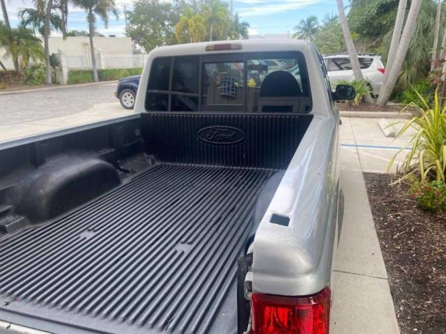 2002 Silver Frost Metallic /Dark Graphite Ford Ranger XLT 1 OWNER FLORIDA (1FTYR14U62P) with an 3.0L SEFI V6 Engine engine, Automatic transmission, located at 4701 North Dixie Hwy, Pompano Beach, FL, 33064, (954) 422-2889, 26.240938, -80.123474 - OUR WEBPAGE FLORIDACARS1.COM HAS OVER 100 PHOTOS AND FREE CARFAX LINK 2002 FORD RANGER EDGE VIN: 1FTYR14U62PA85366 1 F T Y R 1 4 U 6 2 P A 8 5 3 6 6 CLUB CAB PICKUP 3.0L V6 F OHV GASOLINE REAR WHEEL DRIVE Top Features Bed Liner Cloth Seats Tow Hitch Basic Features ABS Brakes Automatic Transmission C - Photo#73