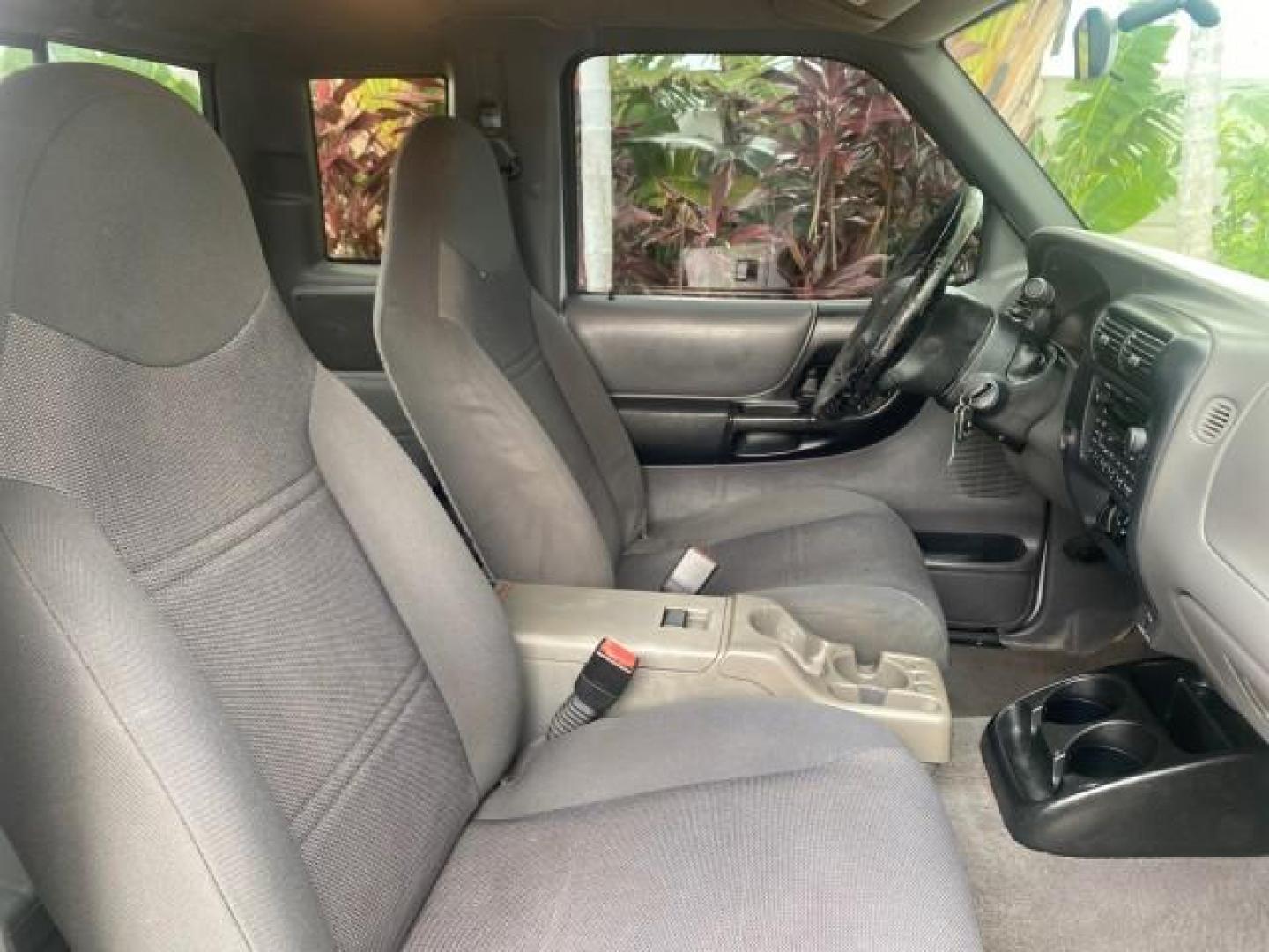 2002 Silver Frost Metallic /Dark Graphite Ford Ranger XLT 1 OWNER FLORIDA (1FTYR14U62P) with an 3.0L SEFI V6 Engine engine, Automatic transmission, located at 4701 North Dixie Hwy, Pompano Beach, FL, 33064, (954) 422-2889, 26.240938, -80.123474 - OUR WEBPAGE FLORIDACARS1.COM HAS OVER 100 PHOTOS AND FREE CARFAX LINK 2002 FORD RANGER EDGE VIN: 1FTYR14U62PA85366 1 F T Y R 1 4 U 6 2 P A 8 5 3 6 6 CLUB CAB PICKUP 3.0L V6 F OHV GASOLINE REAR WHEEL DRIVE Top Features Bed Liner Cloth Seats Tow Hitch Basic Features ABS Brakes Automatic Transmission C - Photo#88