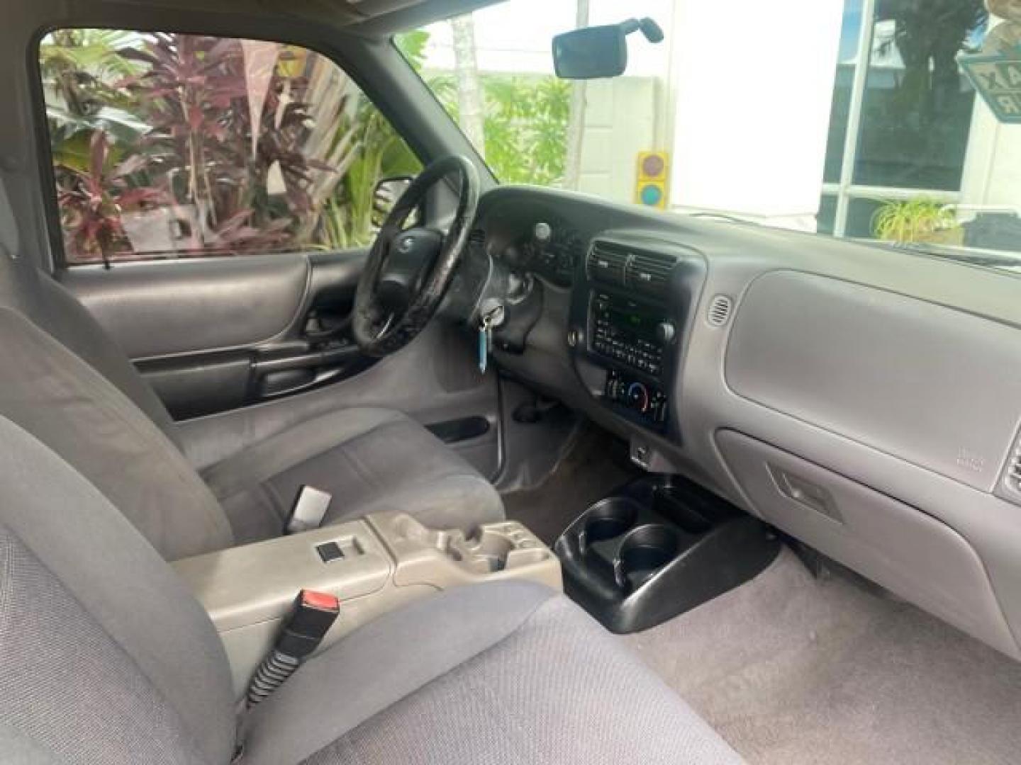 2002 Silver Frost Metallic /Dark Graphite Ford Ranger XLT 1 OWNER FLORIDA (1FTYR14U62P) with an 3.0L SEFI V6 Engine engine, Automatic transmission, located at 4701 North Dixie Hwy, Pompano Beach, FL, 33064, (954) 422-2889, 26.240938, -80.123474 - OUR WEBPAGE FLORIDACARS1.COM HAS OVER 100 PHOTOS AND FREE CARFAX LINK 2002 FORD RANGER EDGE VIN: 1FTYR14U62PA85366 1 F T Y R 1 4 U 6 2 P A 8 5 3 6 6 CLUB CAB PICKUP 3.0L V6 F OHV GASOLINE REAR WHEEL DRIVE Top Features Bed Liner Cloth Seats Tow Hitch Basic Features ABS Brakes Automatic Transmission C - Photo#92