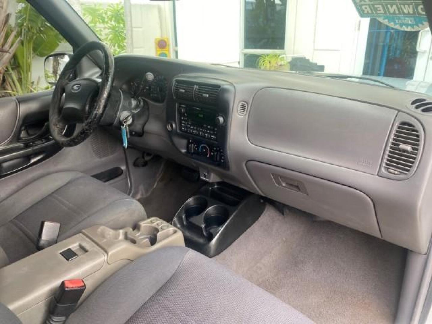 2002 Silver Frost Metallic /Dark Graphite Ford Ranger XLT 1 OWNER FLORIDA (1FTYR14U62P) with an 3.0L SEFI V6 Engine engine, Automatic transmission, located at 4701 North Dixie Hwy, Pompano Beach, FL, 33064, (954) 422-2889, 26.240938, -80.123474 - OUR WEBPAGE FLORIDACARS1.COM HAS OVER 100 PHOTOS AND FREE CARFAX LINK 2002 FORD RANGER EDGE VIN: 1FTYR14U62PA85366 1 F T Y R 1 4 U 6 2 P A 8 5 3 6 6 CLUB CAB PICKUP 3.0L V6 F OHV GASOLINE REAR WHEEL DRIVE Top Features Bed Liner Cloth Seats Tow Hitch Basic Features ABS Brakes Automatic Transmission C - Photo#93