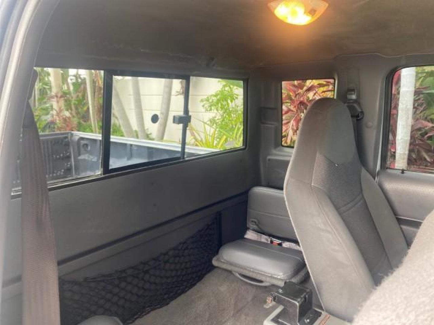 2002 Silver Frost Metallic /Dark Graphite Ford Ranger XLT 1 OWNER FLORIDA (1FTYR14U62P) with an 3.0L SEFI V6 Engine engine, Automatic transmission, located at 4701 North Dixie Hwy, Pompano Beach, FL, 33064, (954) 422-2889, 26.240938, -80.123474 - OUR WEBPAGE FLORIDACARS1.COM HAS OVER 100 PHOTOS AND FREE CARFAX LINK 2002 FORD RANGER EDGE VIN: 1FTYR14U62PA85366 1 F T Y R 1 4 U 6 2 P A 8 5 3 6 6 CLUB CAB PICKUP 3.0L V6 F OHV GASOLINE REAR WHEEL DRIVE Top Features Bed Liner Cloth Seats Tow Hitch Basic Features ABS Brakes Automatic Transmission C - Photo#96